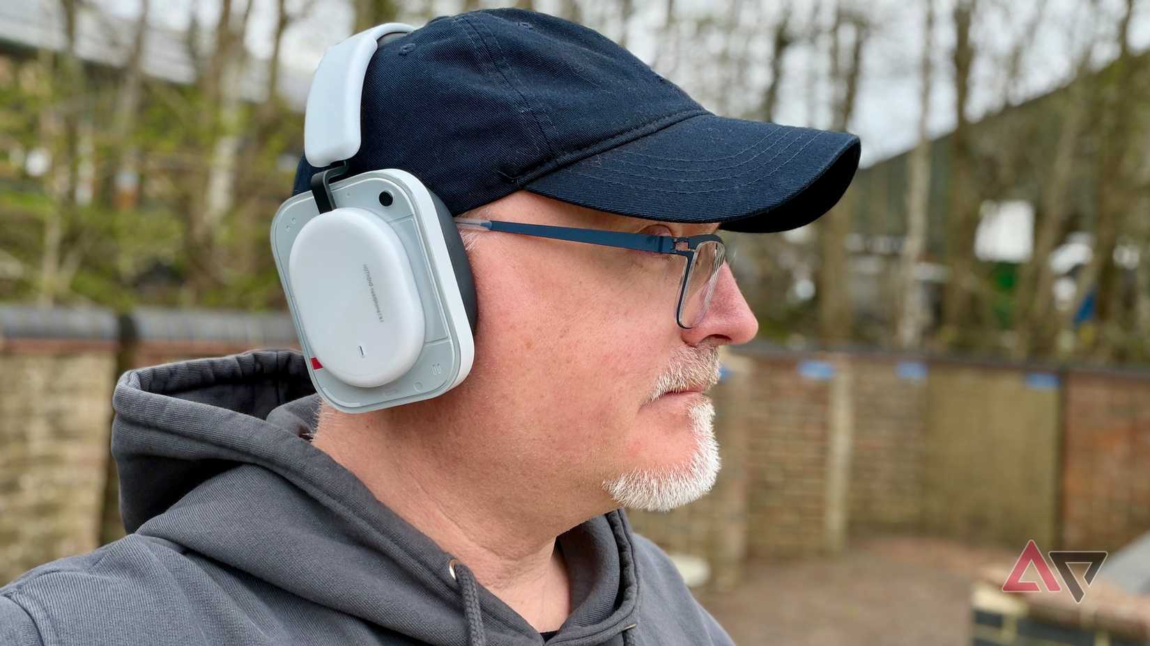 A person wearing the Nothing Headphone (a)