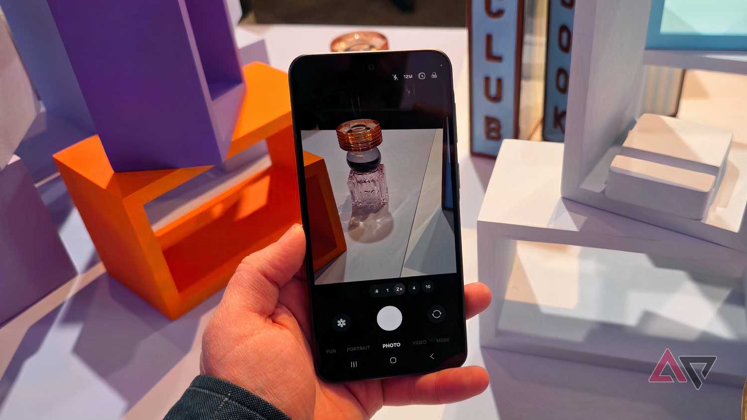 The Samsung Galaxy A37's viewfinder, pointing to a phial at 2x zoom.