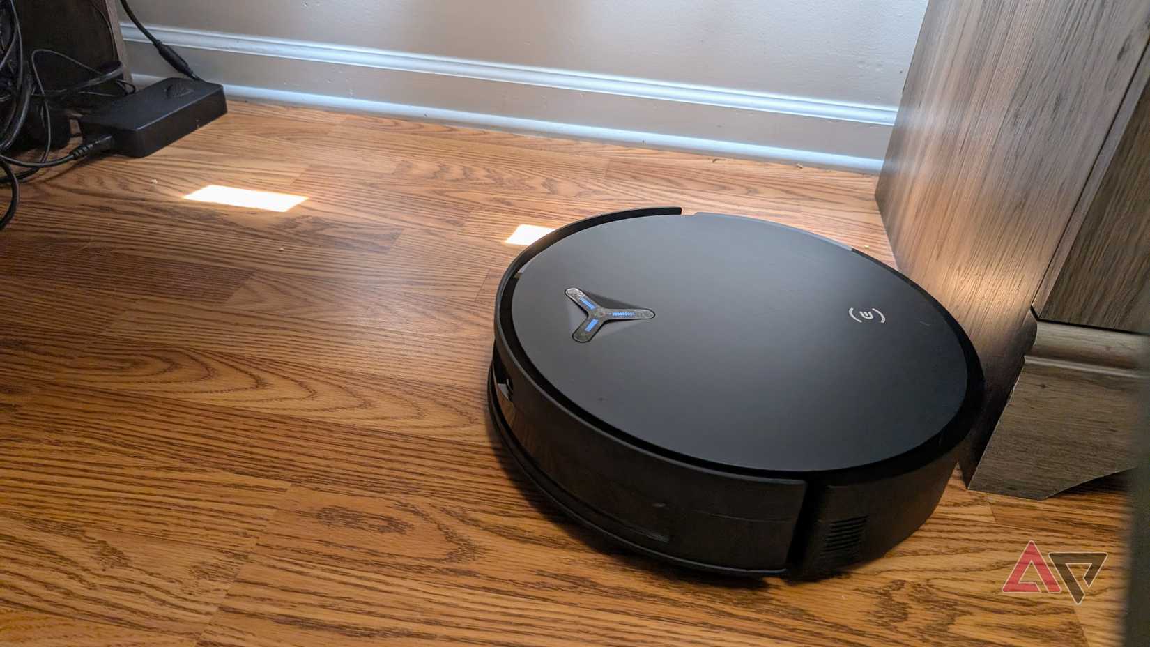 Deebot x12 OmniCyclone cleaning under desk