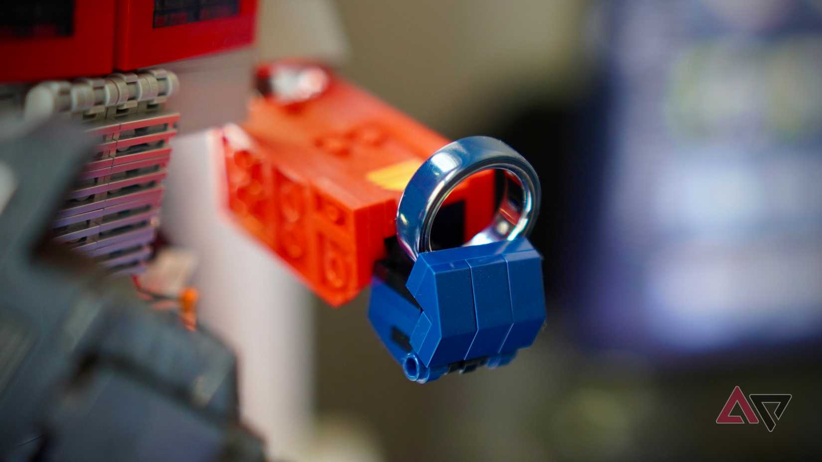 Optimus Prime holding an Oura Ring 4
