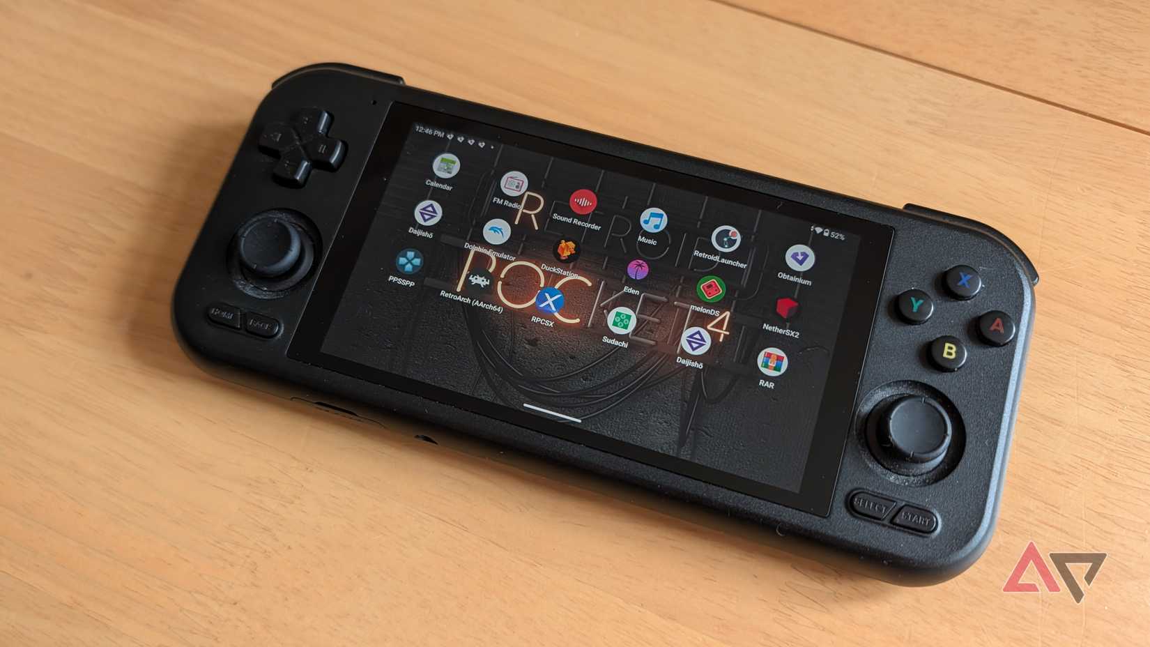 The Retroid Pocket 4 Pro on a table with the main menu visible.