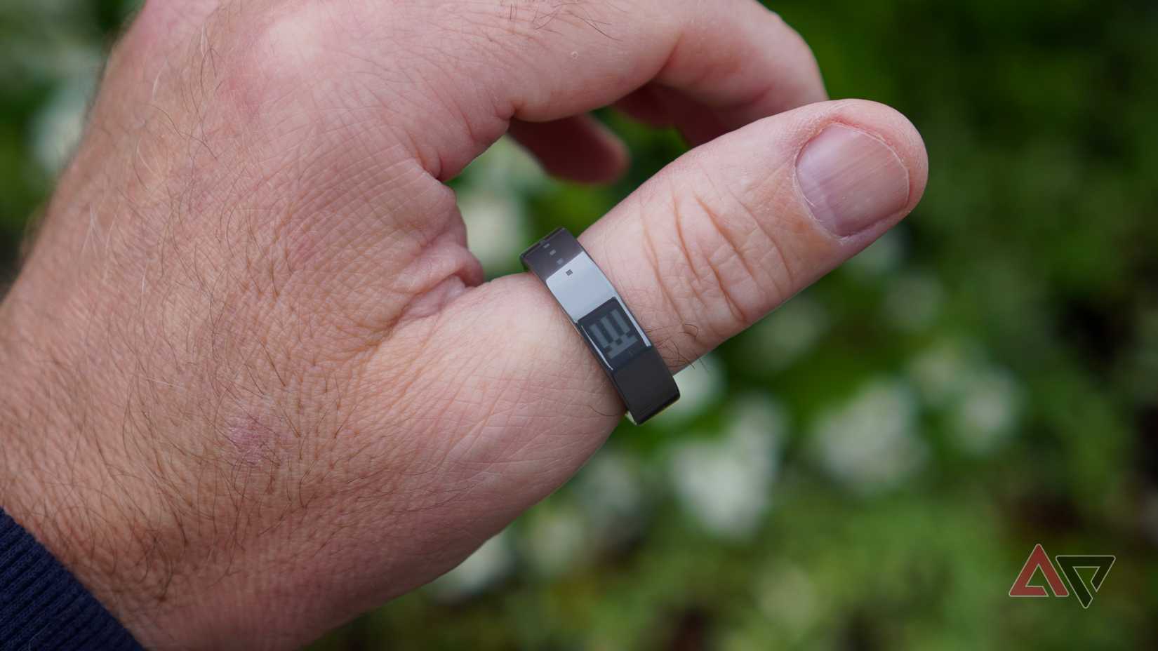 A person wearing the Even Realities G2 smartglasses R1 smart ring