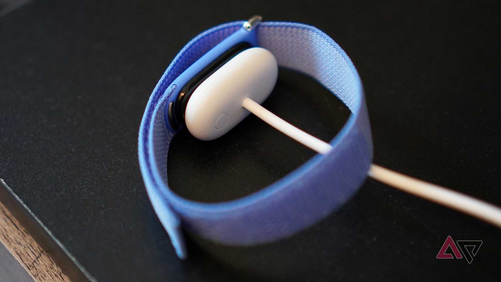 The Fitbit Air on charge