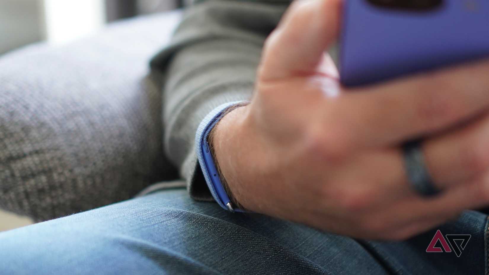 A person wearing the Fitbit Air