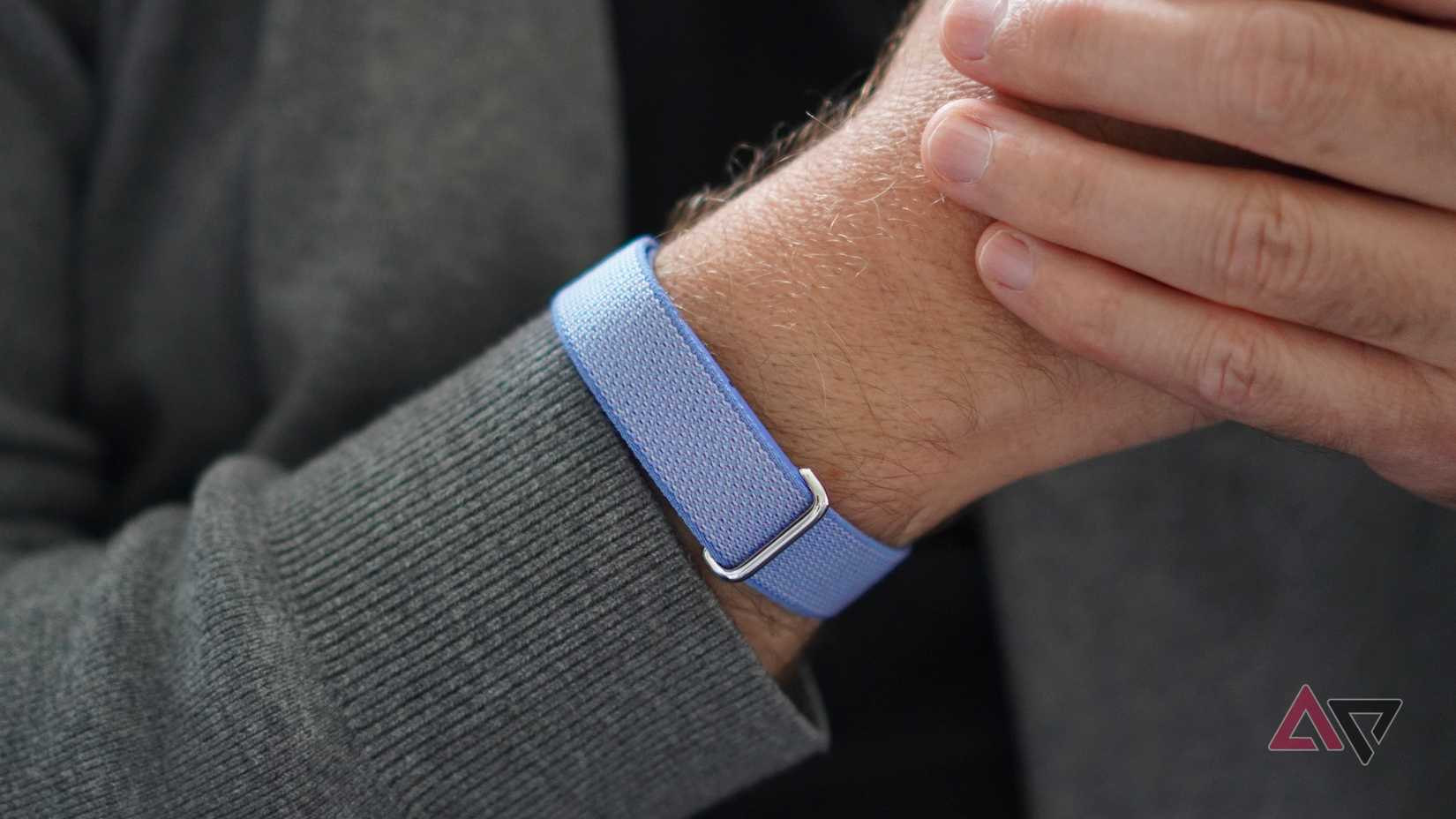 A person wearing the Fitbit Air