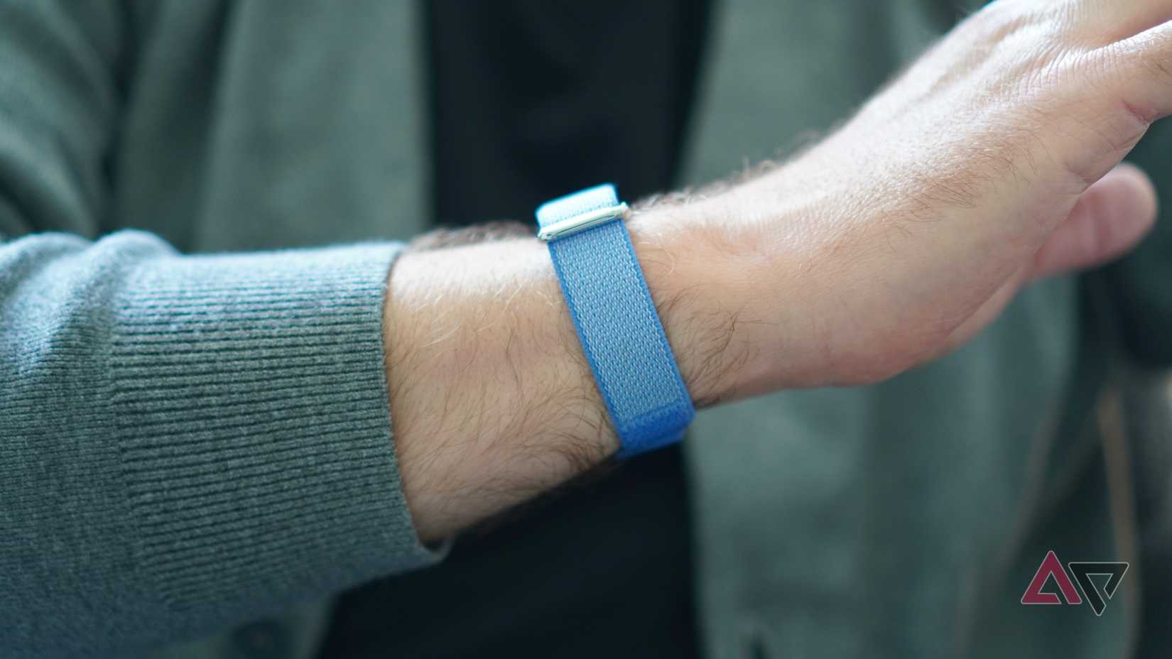A person wearing the Fitbit Air