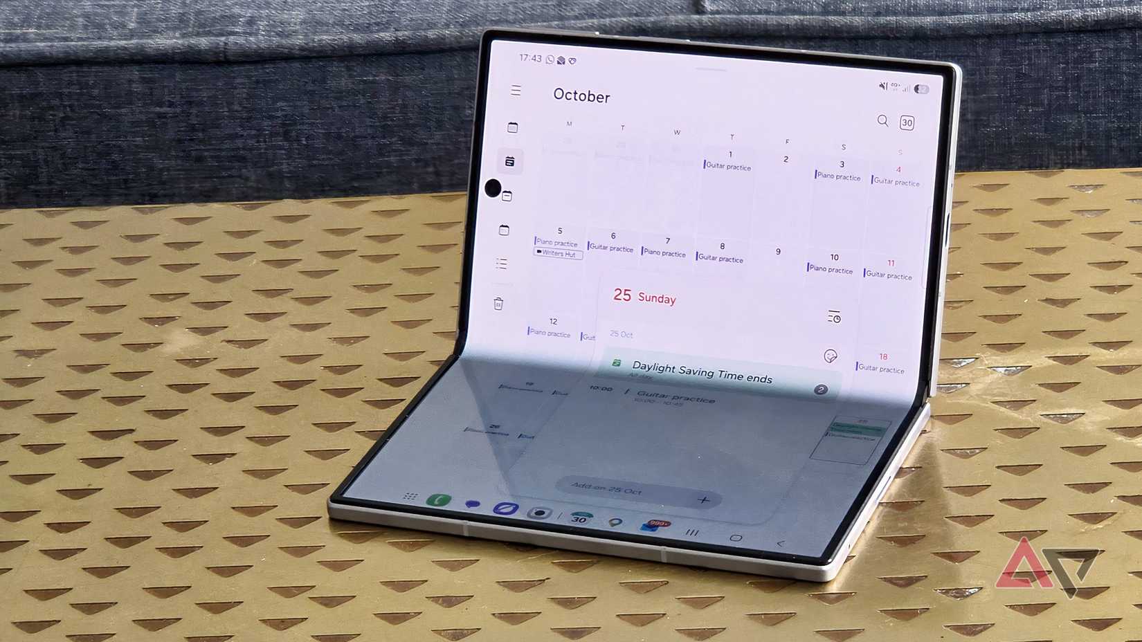 The Samsung Galaxy S26 bent, showing the calendar app.