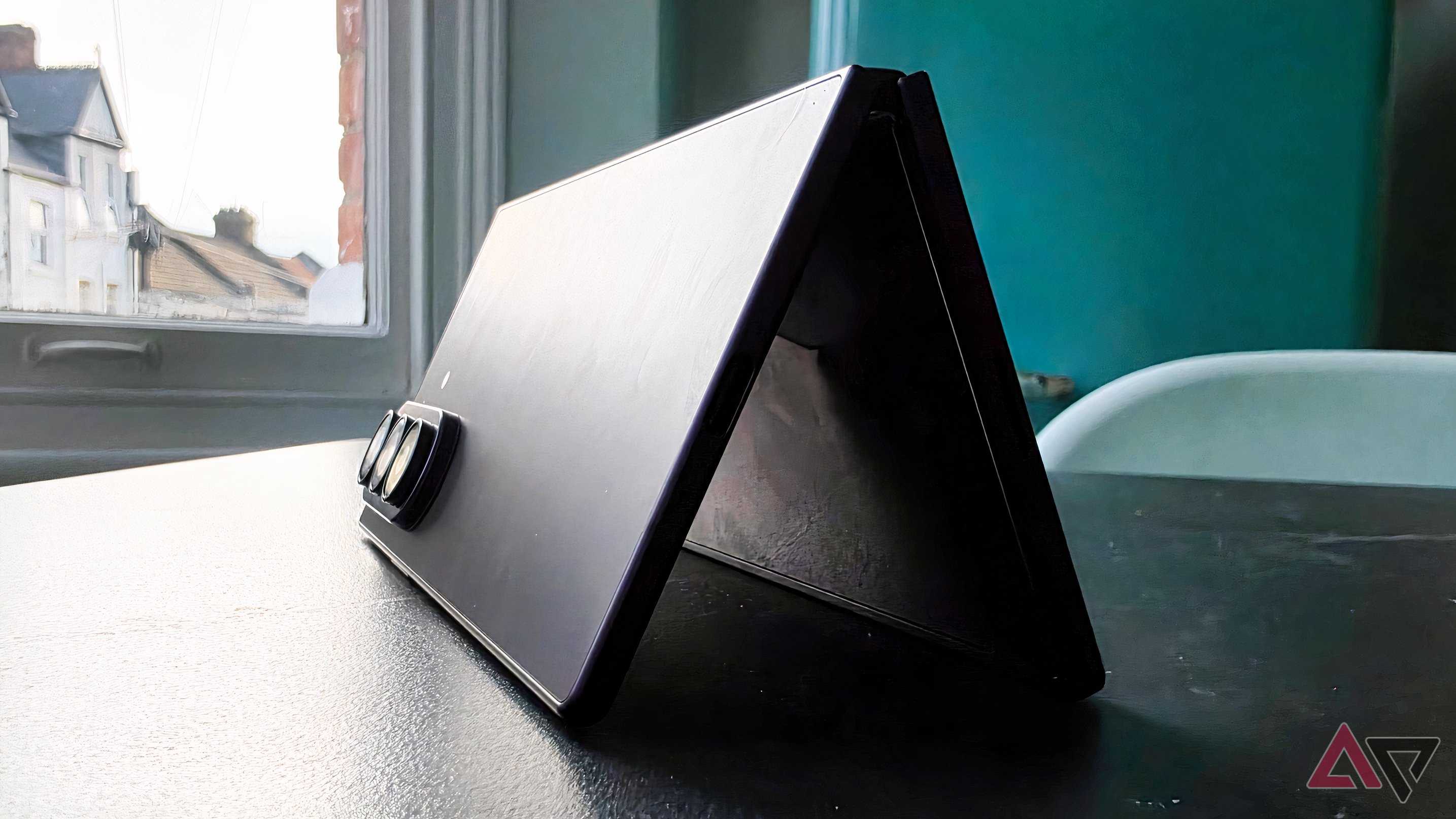 The Samsung Galaxy Z Fold 8 Ultra on a table, half unfolded.