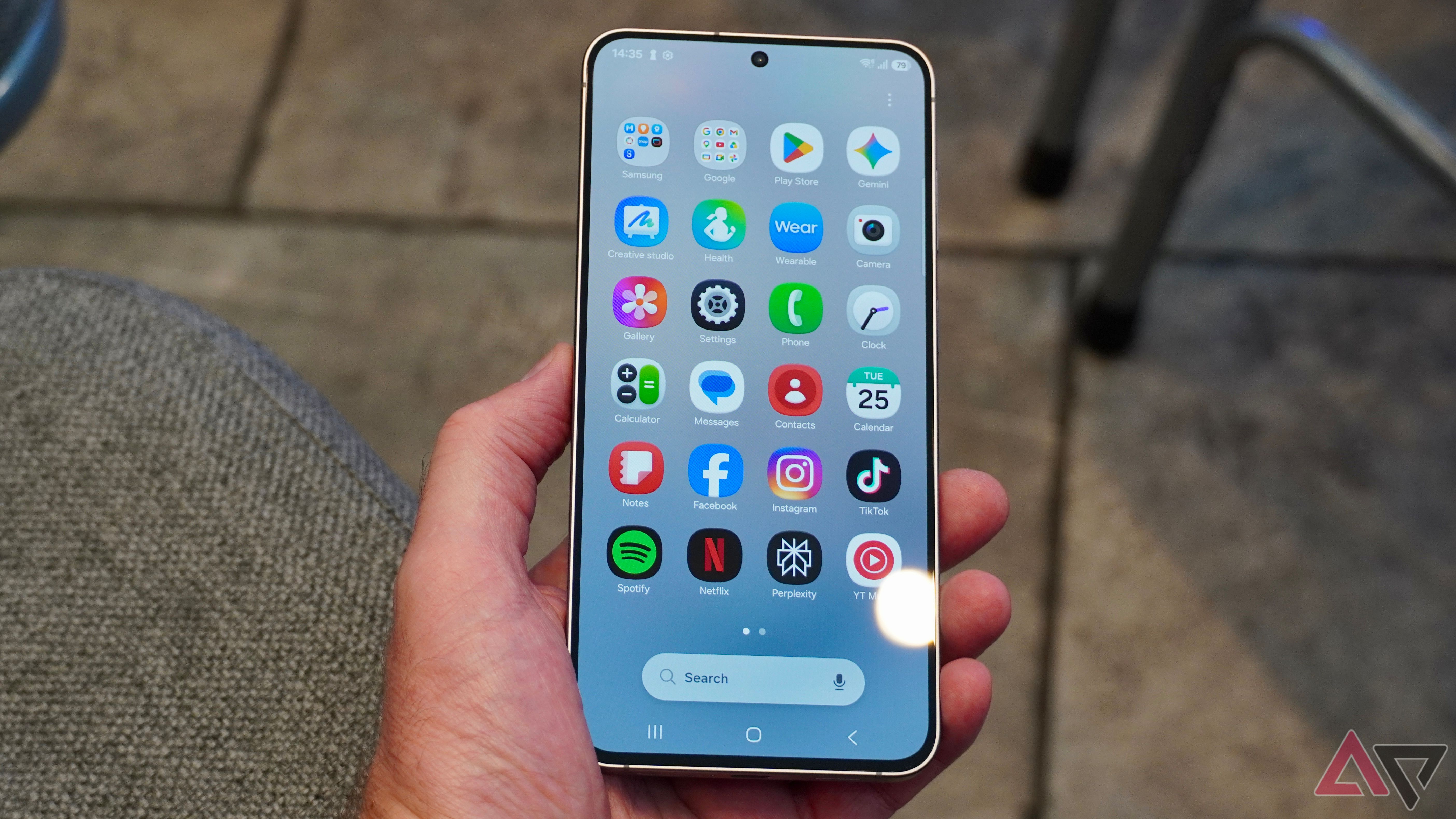 A person holding the Samsung Galaxy S26 FE