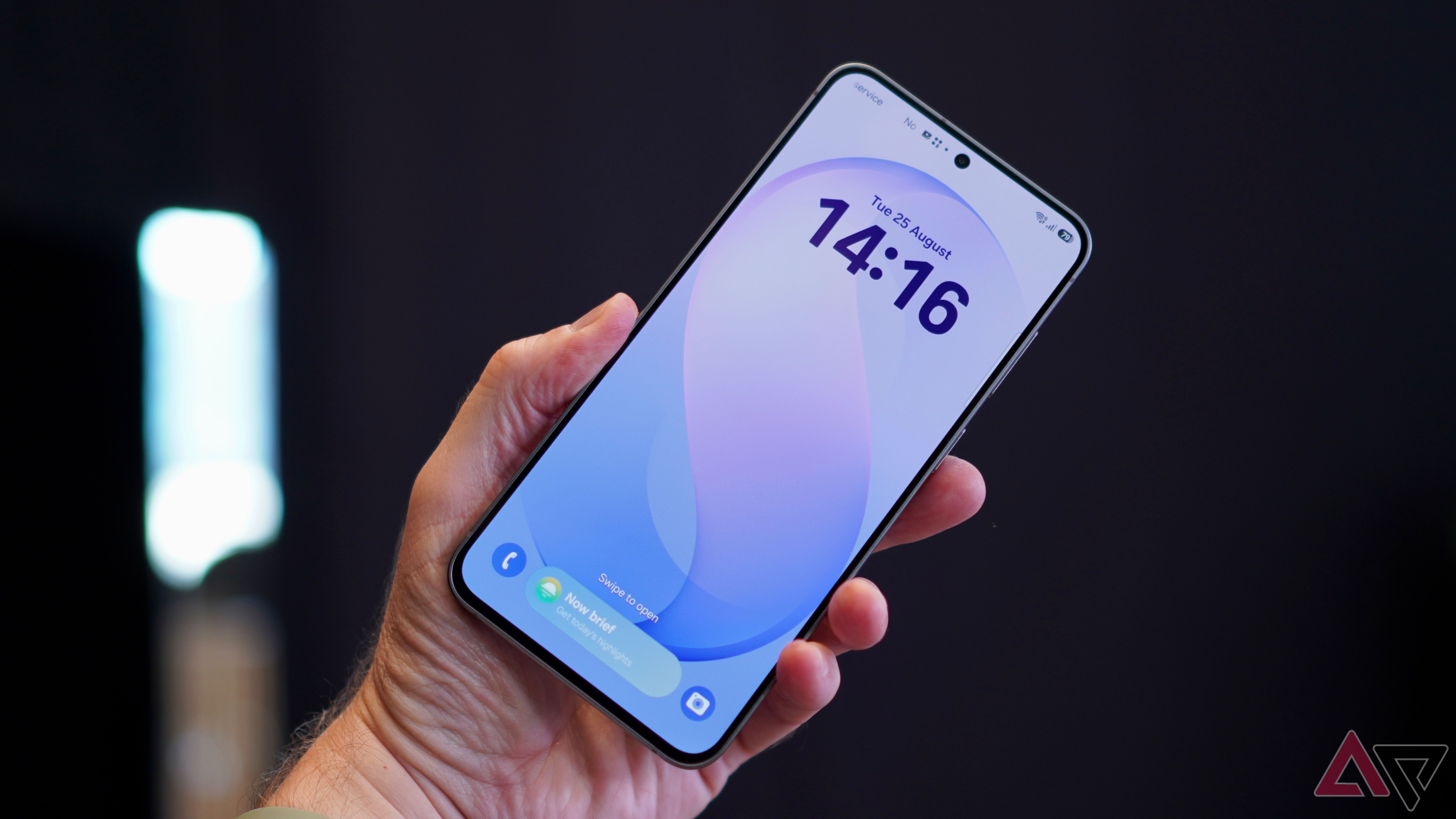 A person holding the Samsung Galaxy S26 FE