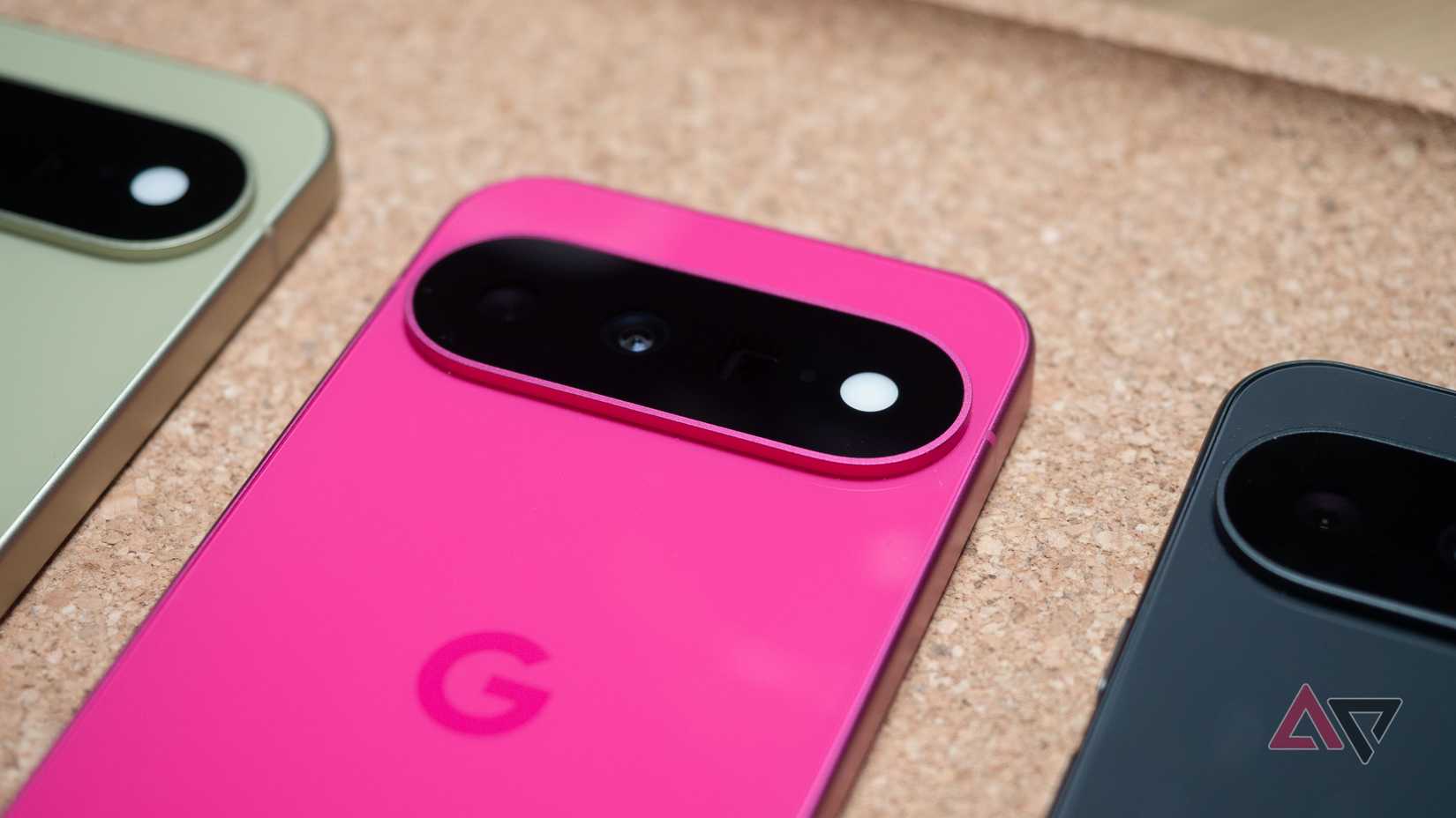 Google Pixel 11 in Hibiscus next to the Pistachio and Obsidian colors, camera close-up