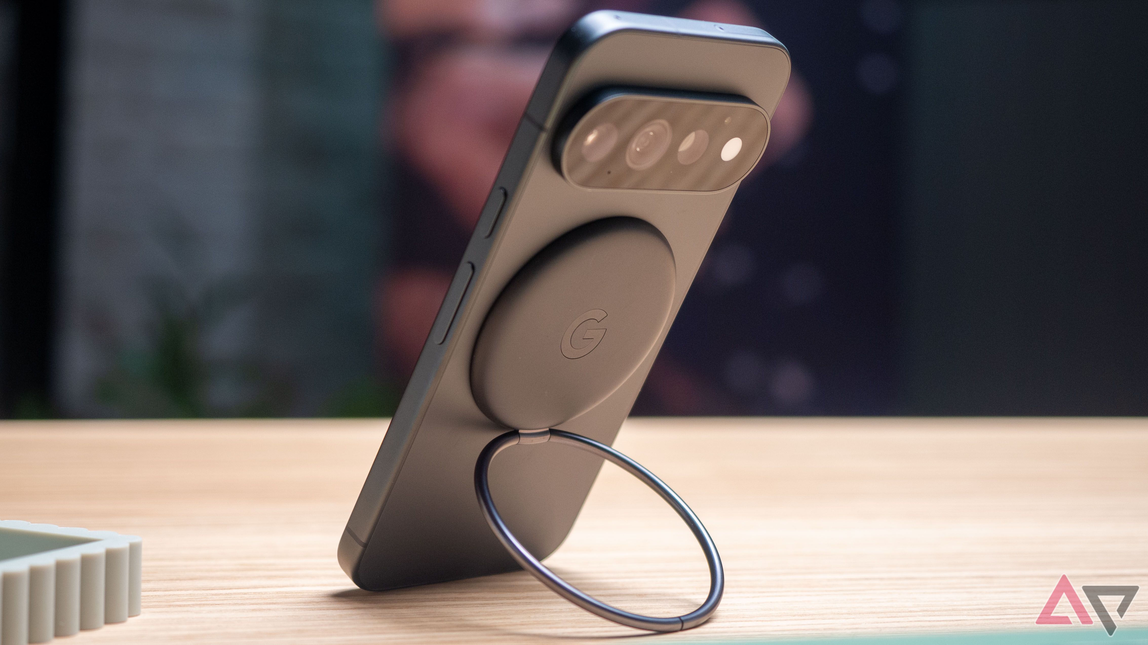 Google Pixel 11 Pro with the new Pixelsnap stand in Obsidian color