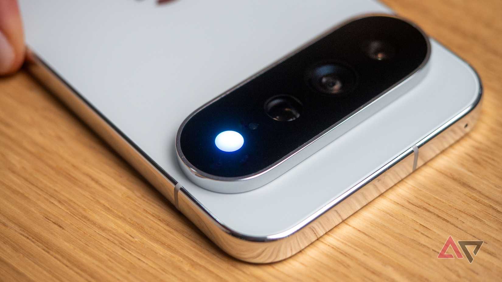 Google Pixel 11 Pro XL in Fog color showing Hi-Light blue contact notification light