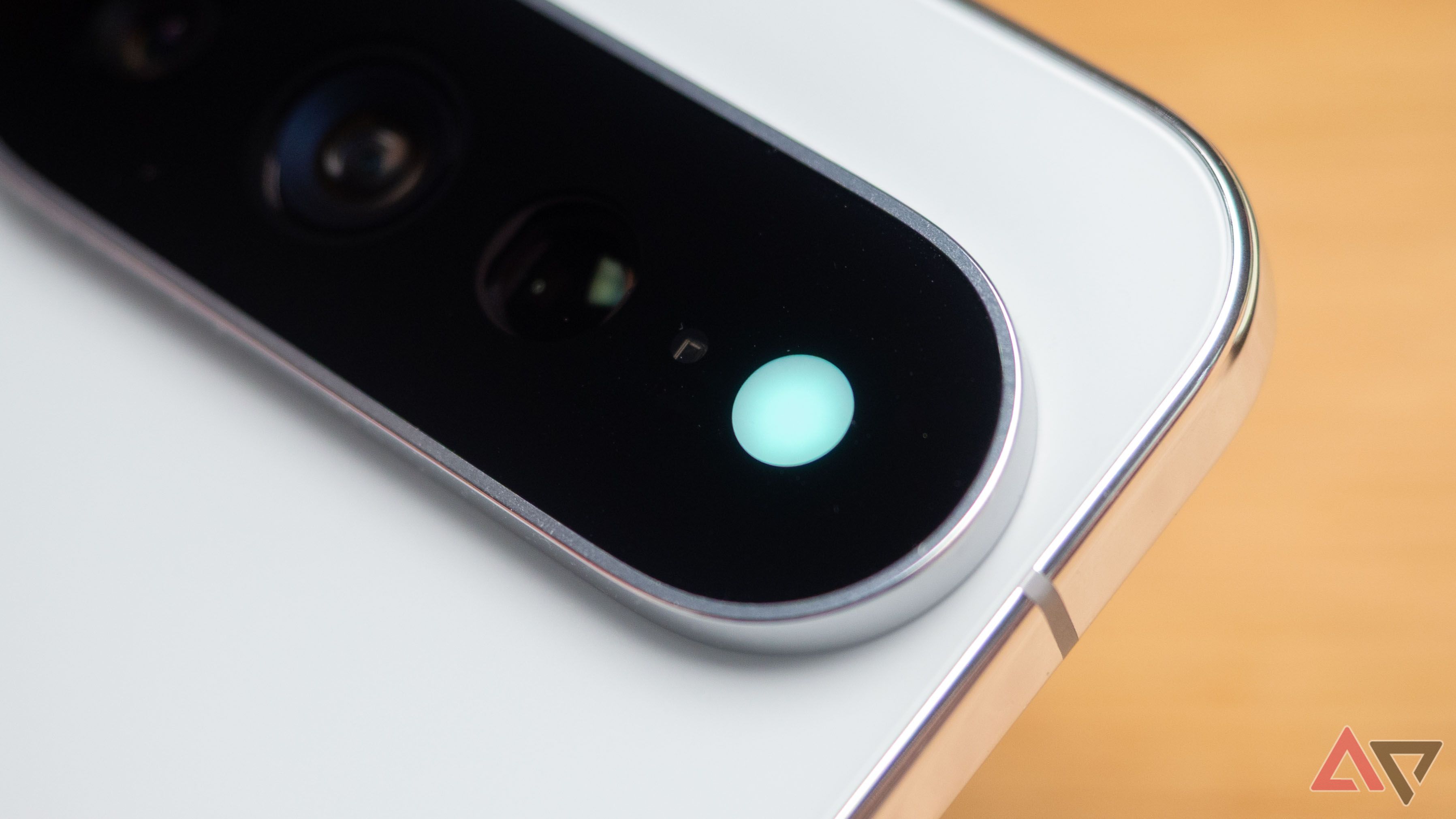 Google Pixel 11 Pro XL in Fog color showing Hi-Light green contact notification light
