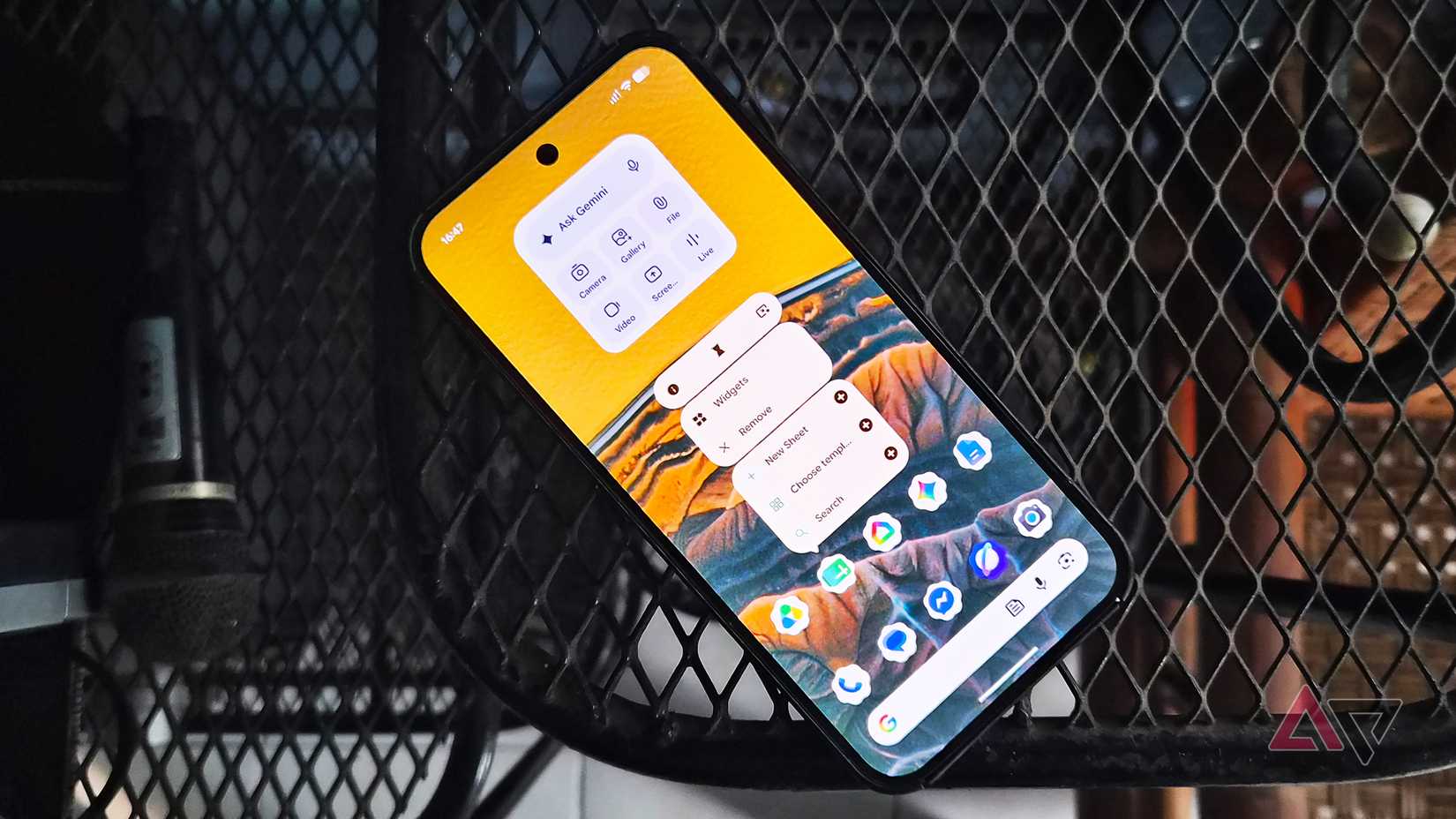 Google Pixel 9 Pro XL with different apps including Sheets and its pop-up menu