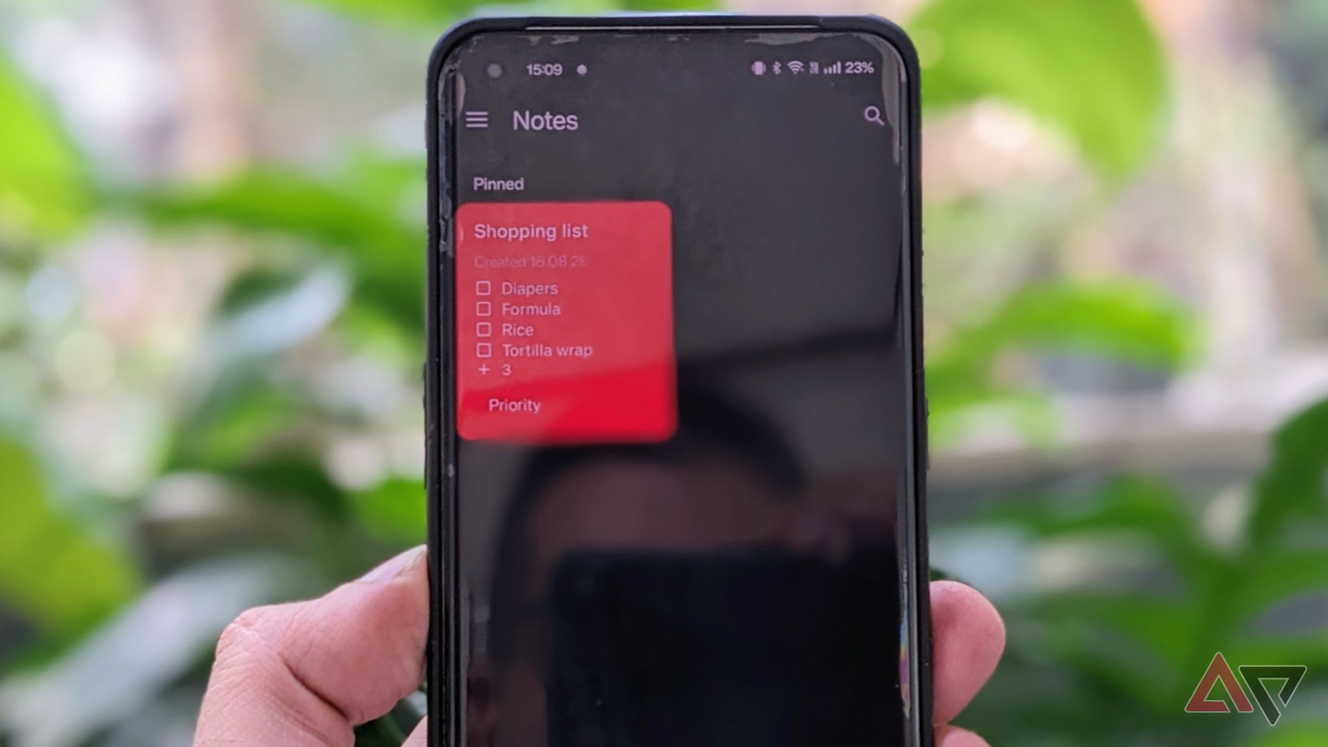 NotallyX on phone showing shopping list in grid view