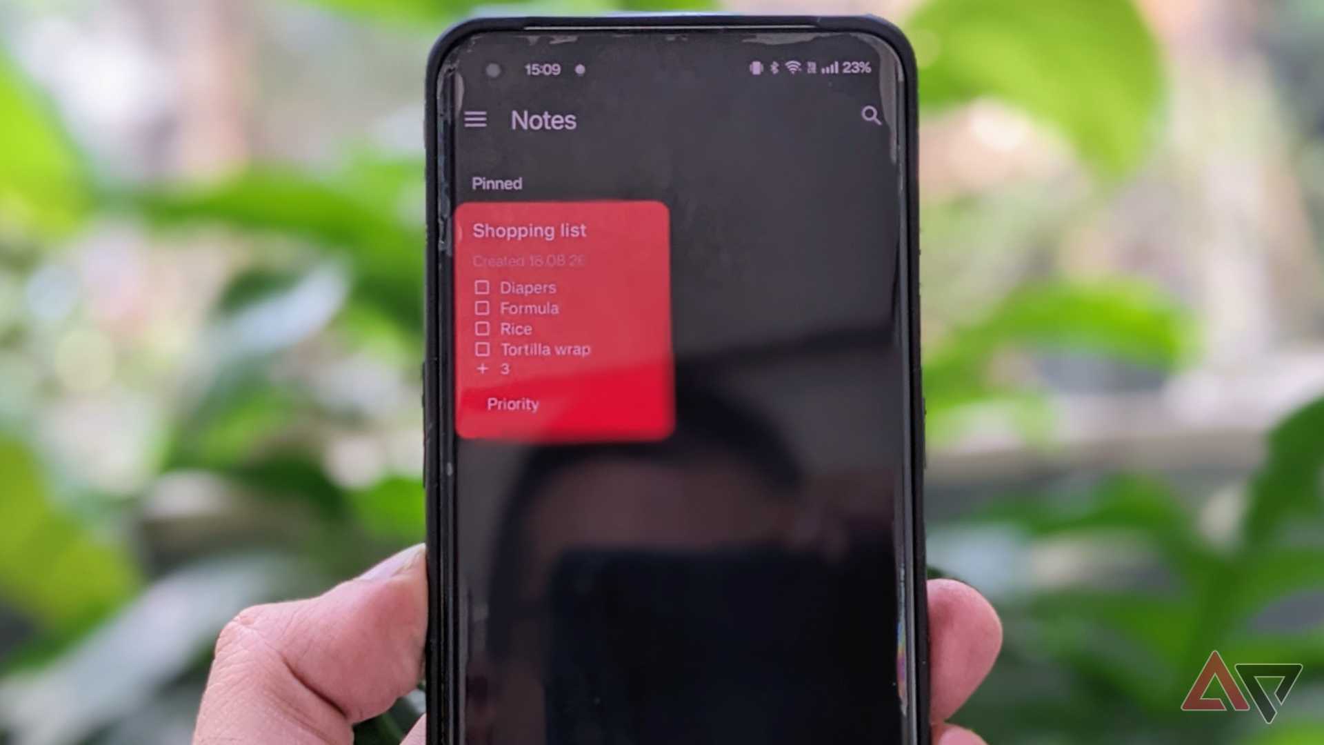 NotallyX on phone showing shopping list in grid view