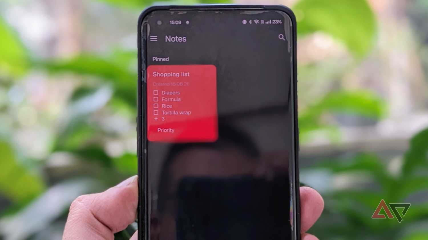 NotallyX on phone showing shopping list in grid view