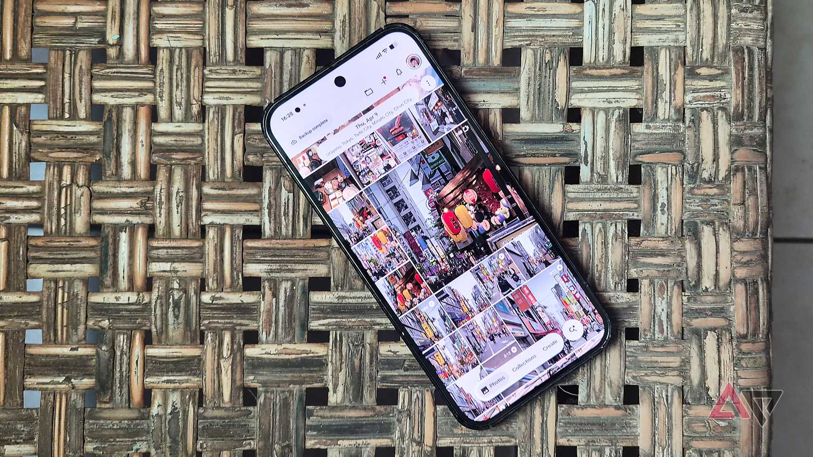 A Google Pixel phone showing the main library in Google Photos
