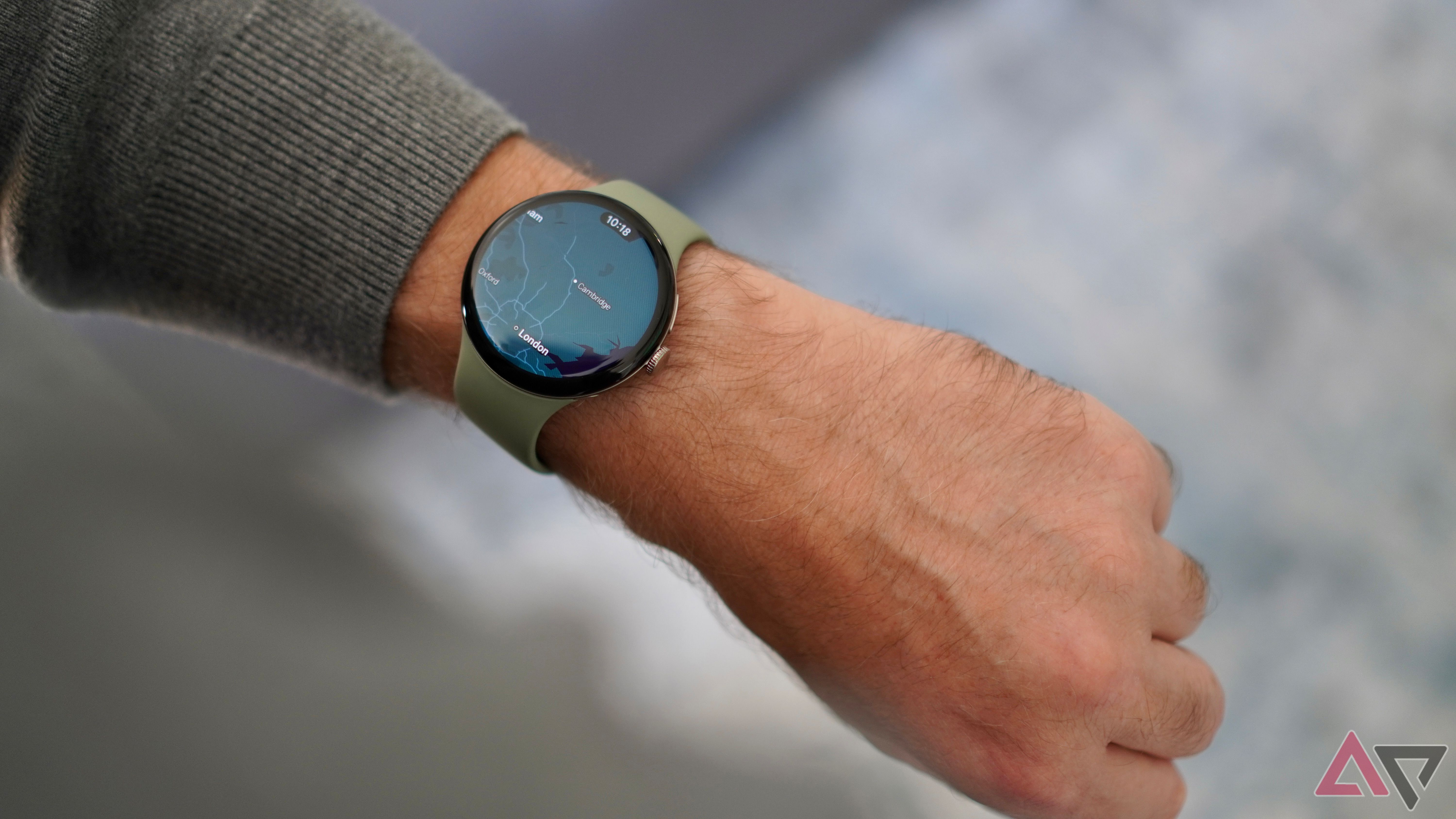 A person wearing the Google Pixel Watch 5, showing Google Maps
