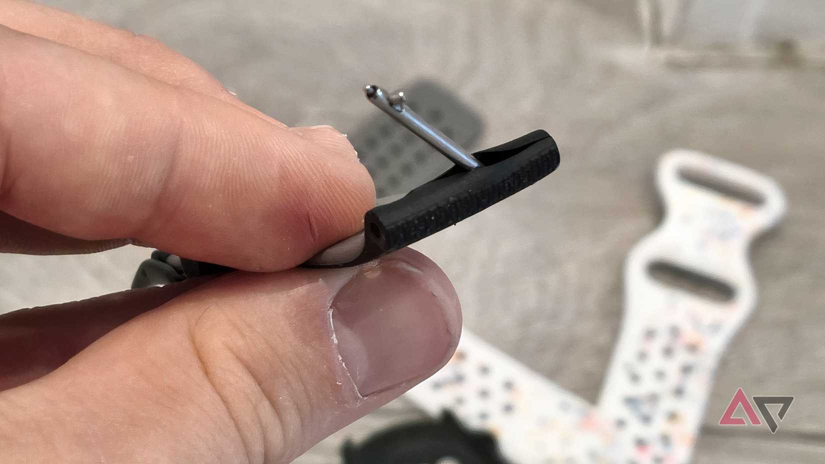 The broken strap of a Polar Vantage M2.
