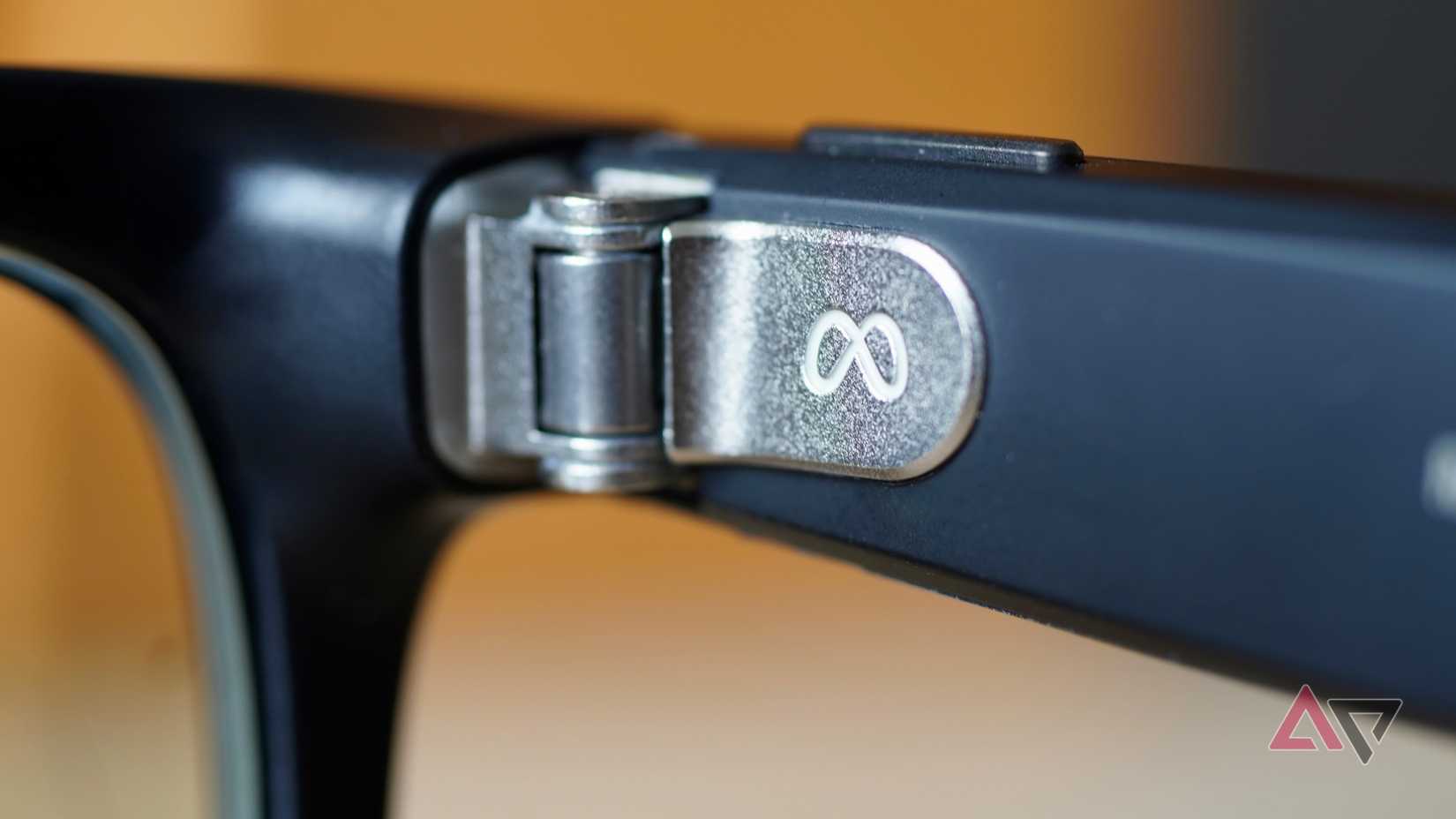 A close-up of the Meta logo on the Ray-Ban Meta smartglasses
