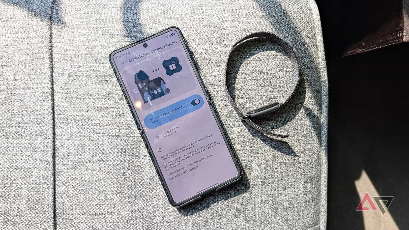 Samsung Galaxy Z Flip 7 smartphone and a Google Fitbit Air connected