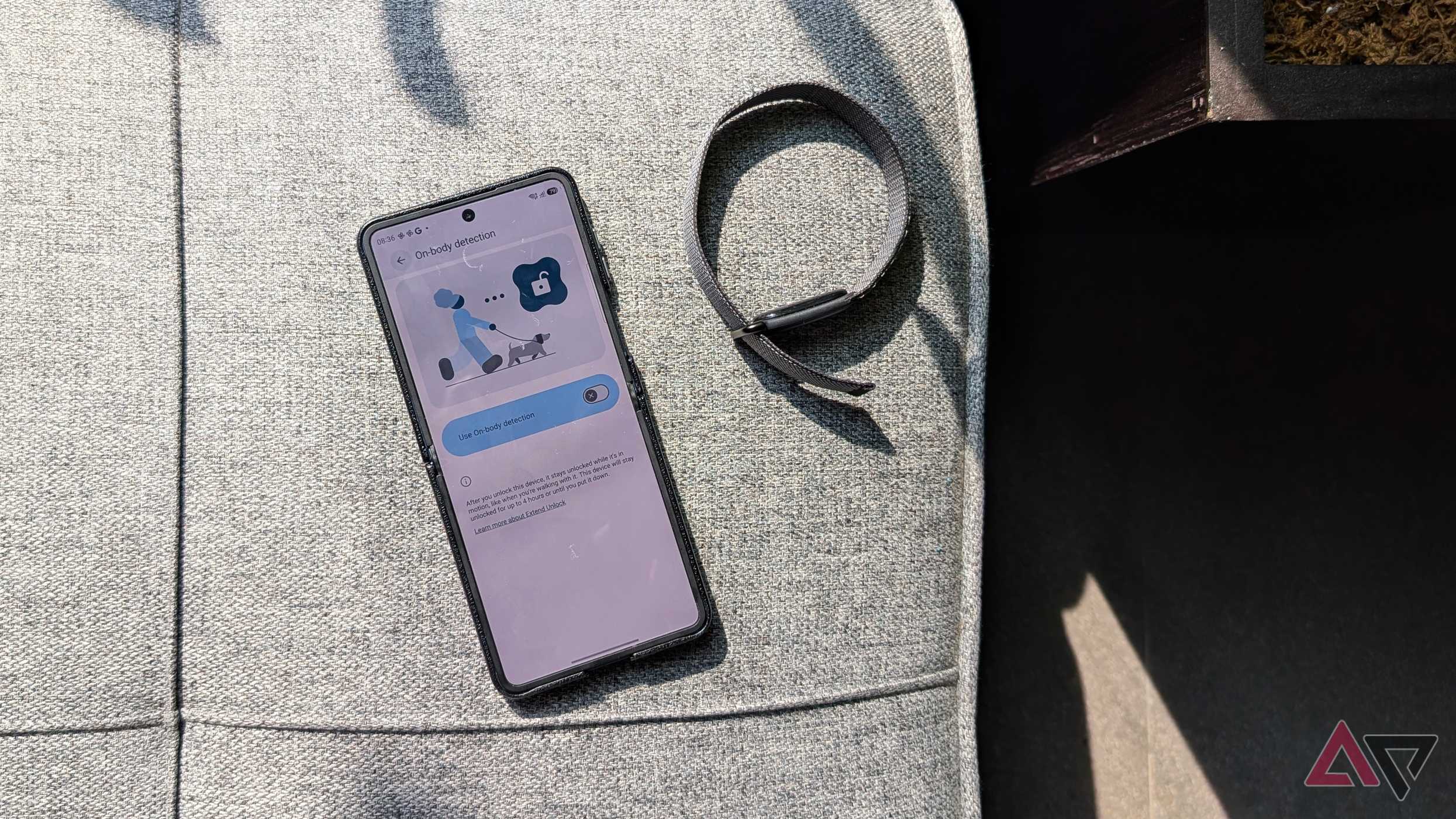 Samsung-Galaxy-Flip-phone-showing-on-body-extend-lock-feature-Google-Fitbit-Air