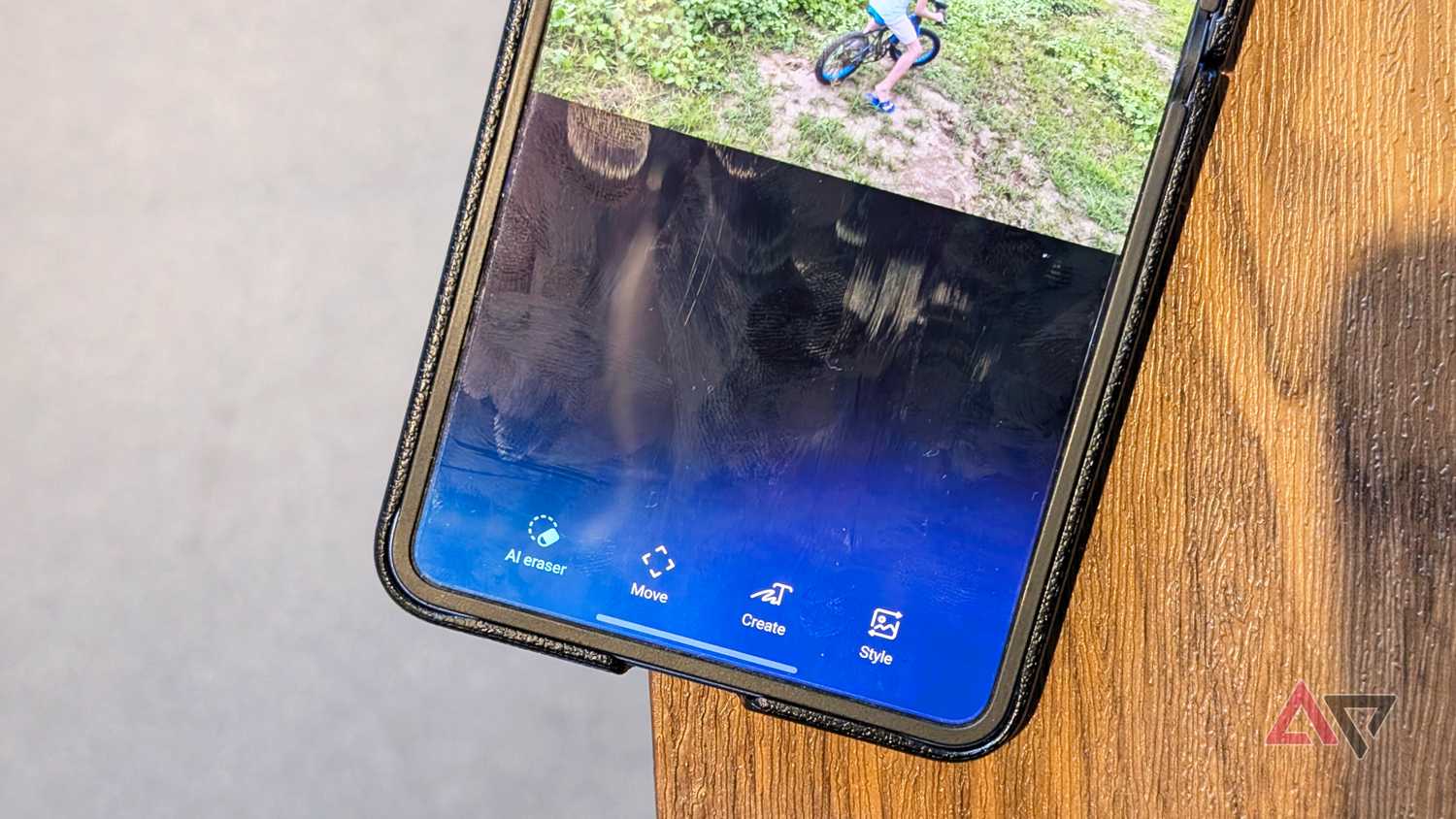 Samsung Gallery AI tools with AI eraser selected on a Galaxy Z Flip 7 smartphone