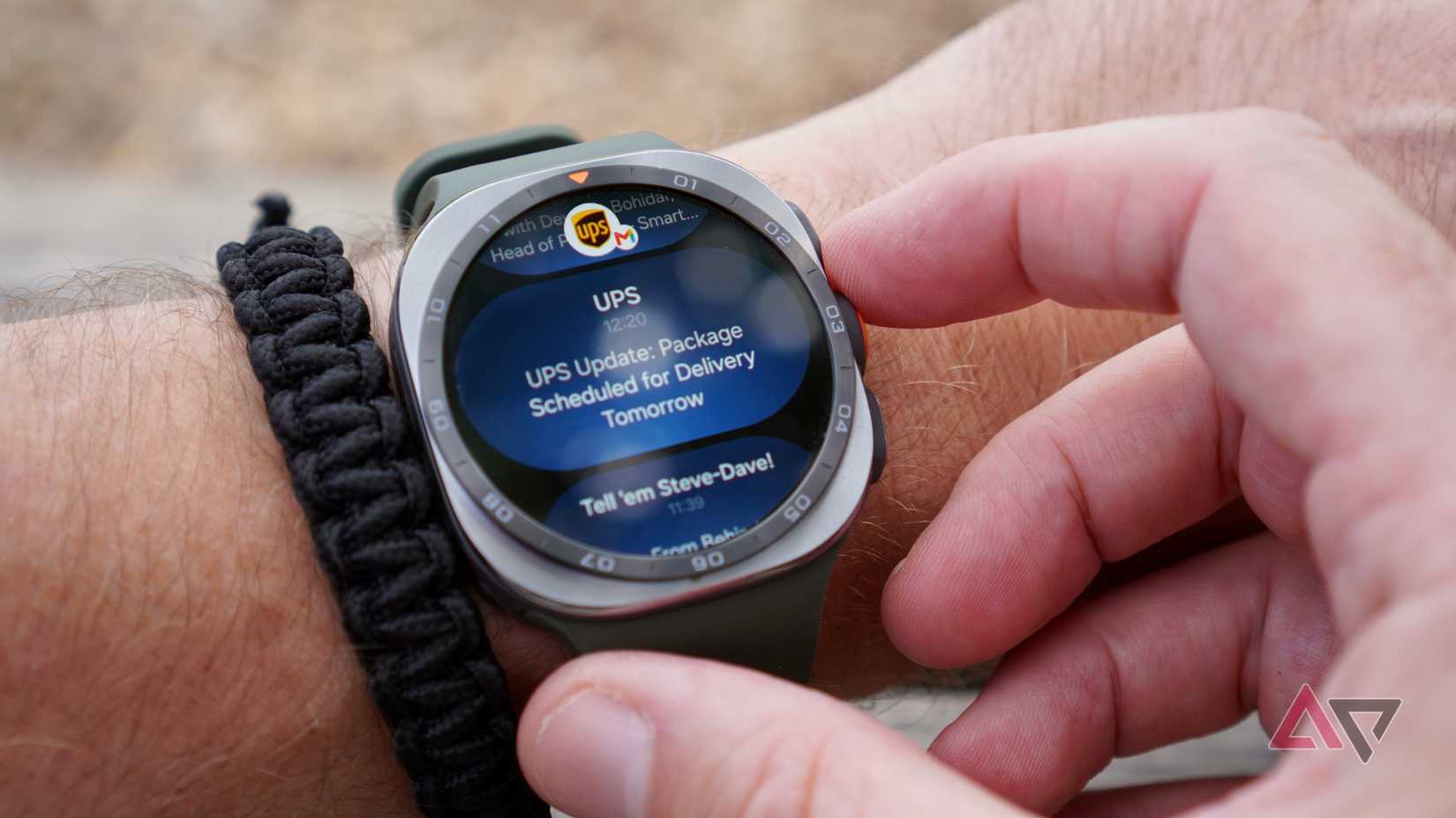 A person wearing the Samsung Galaxy Watch Ultra 2 showing notifications