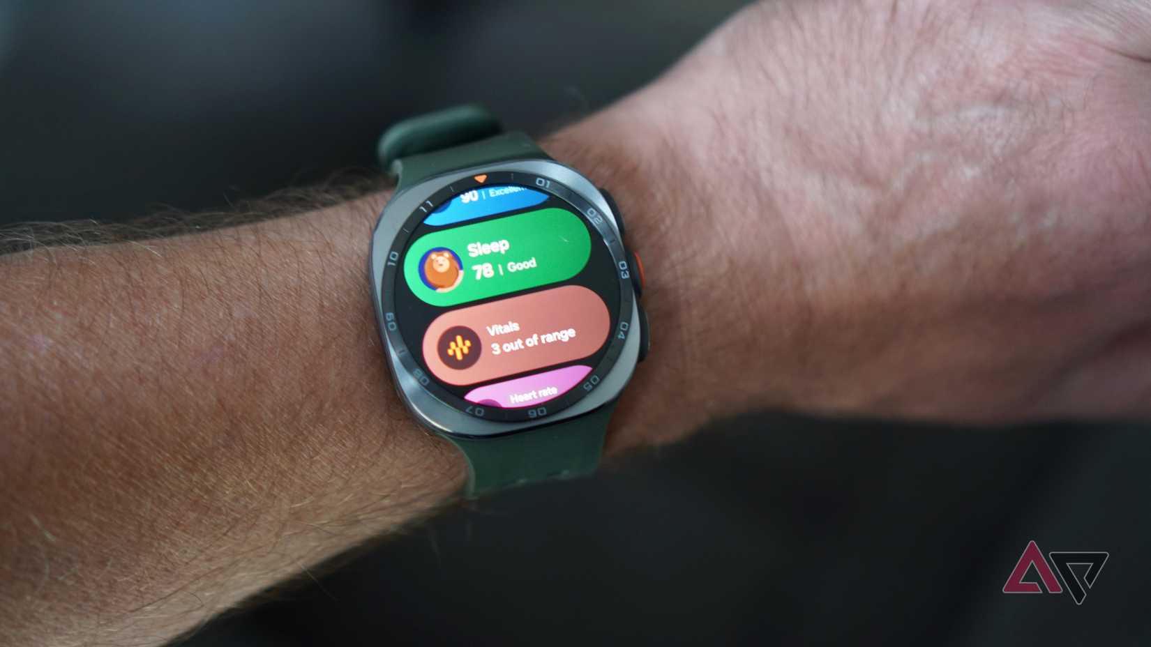 A person wearing the Samsung Galaxy Watch Ultra 2 showing the Vitals app