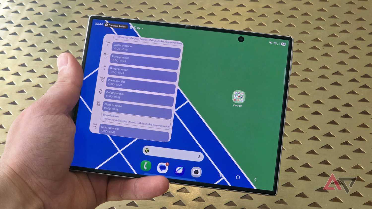 The Samsung Galaxy Z Fold 8 showing a large Calendar schedule widget on half of its wide display.