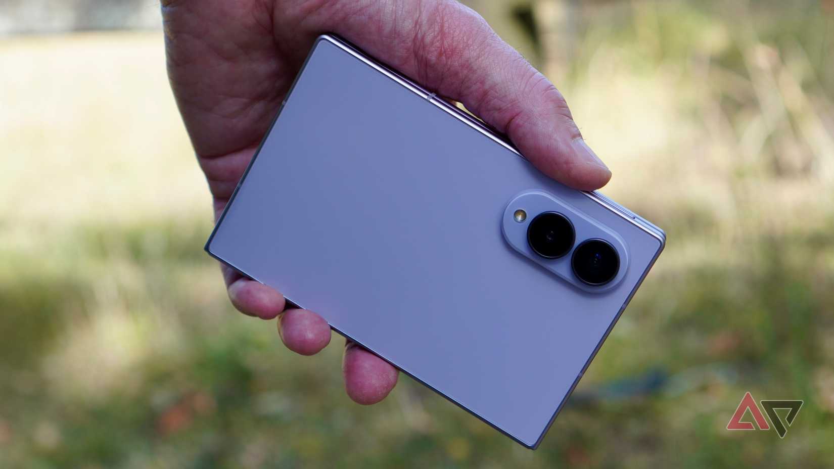 A person holding the Samsung Galaxy Z Fold 8