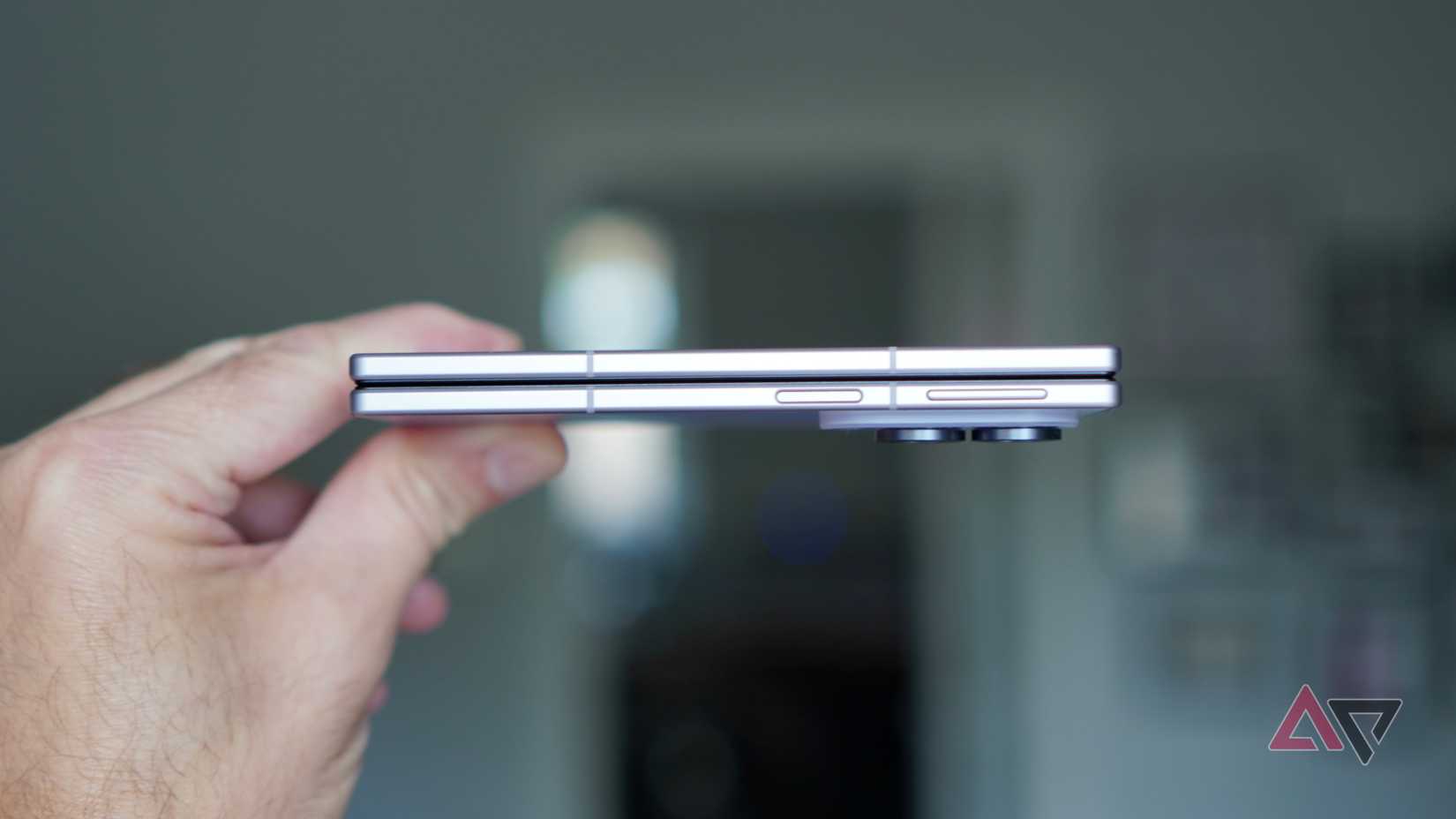 A person holding the Samsung Galaxy Z Fold 8