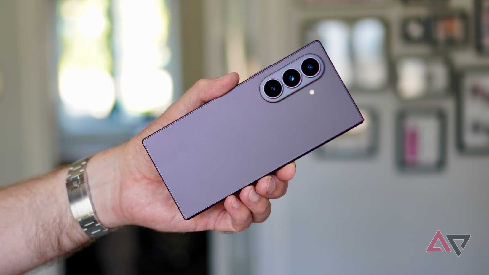 A person holding the Samsung Galaxy Z Fold 8 Ultra