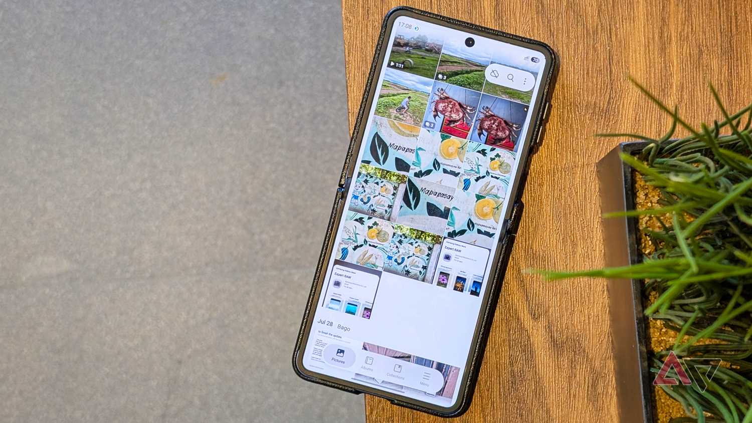 Gallery app open on Samsung Galaxy Z Flip 7 smartphone with photos and videos shown