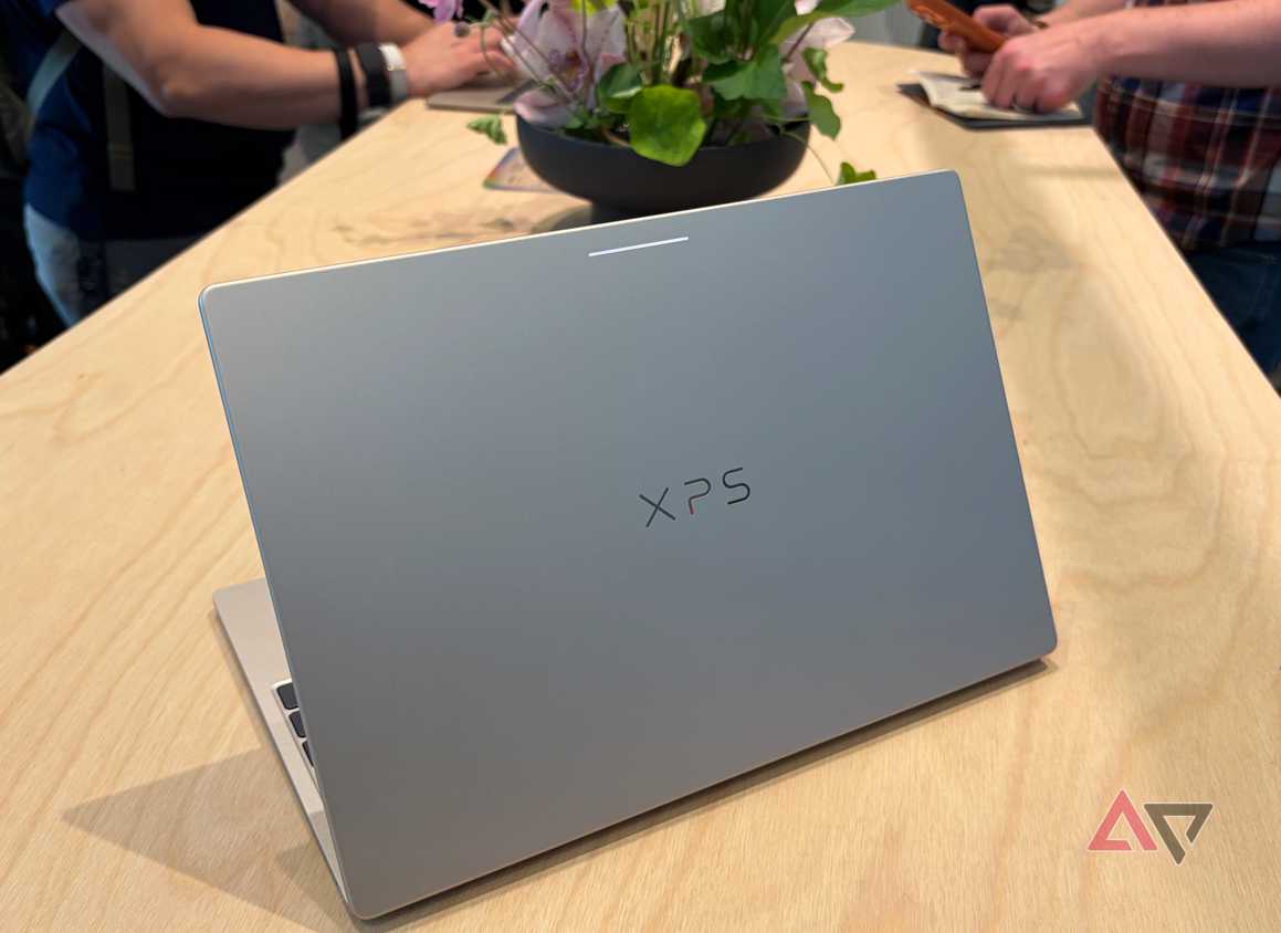 Dell Googlebook on table with flowers