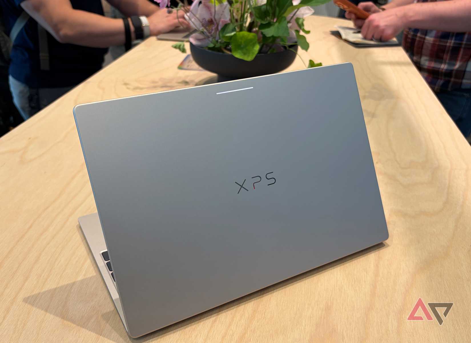 Dell Googlebook on table with flowers