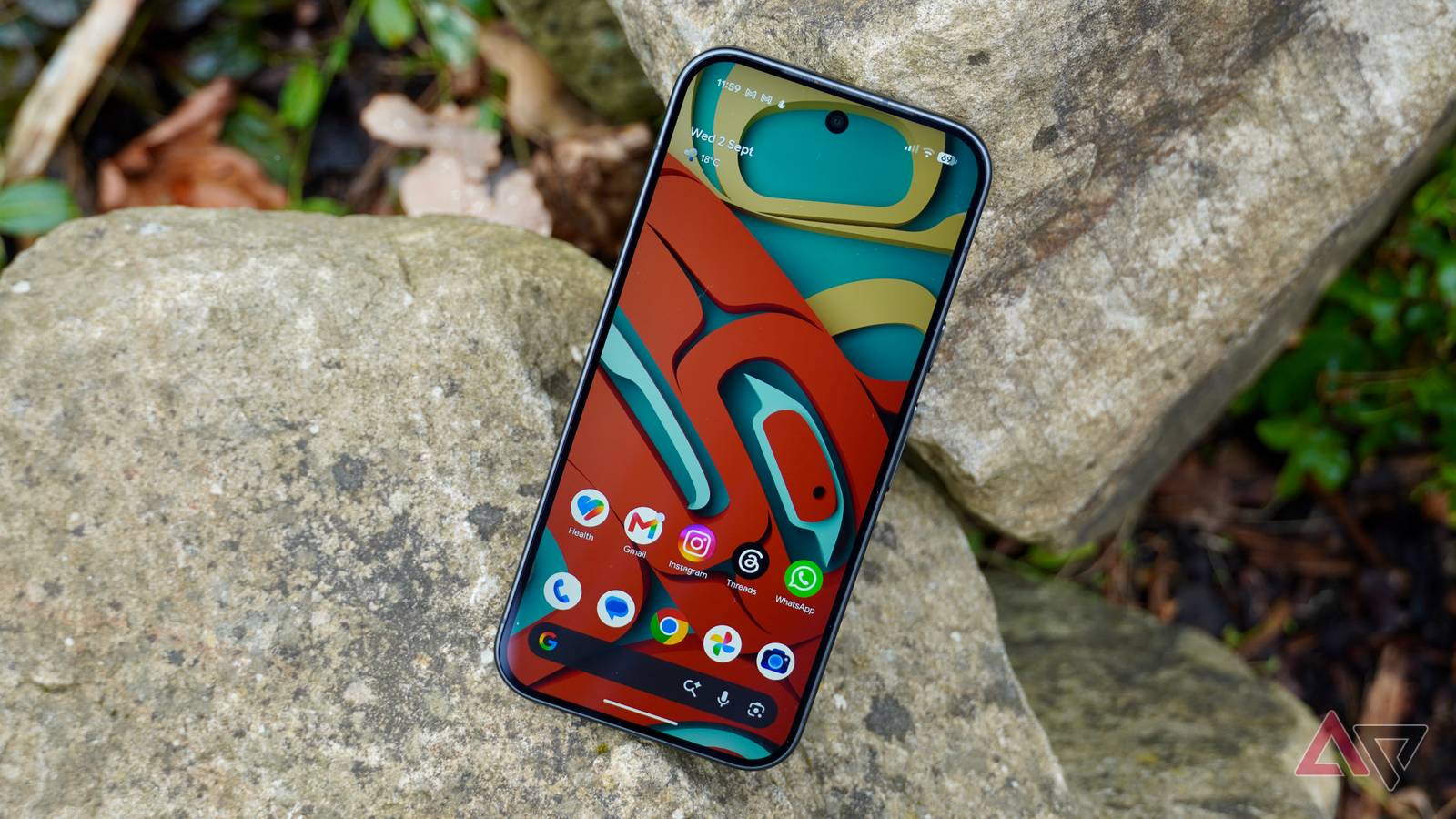 The Google Pixel 11 Pro on a rock