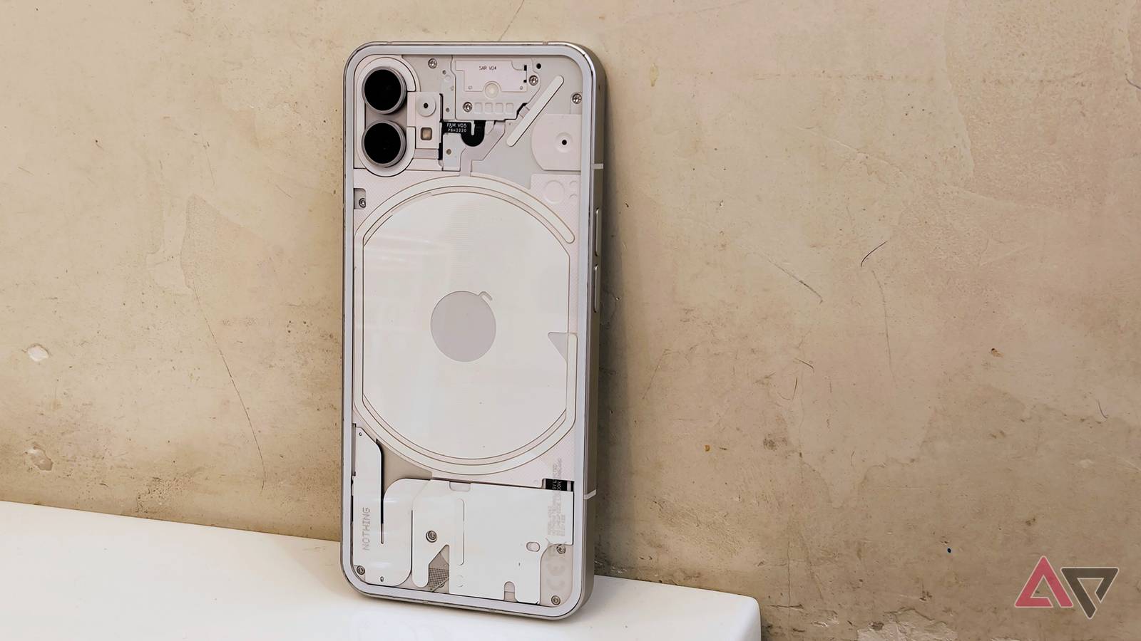 Nothing Phone against the wall left