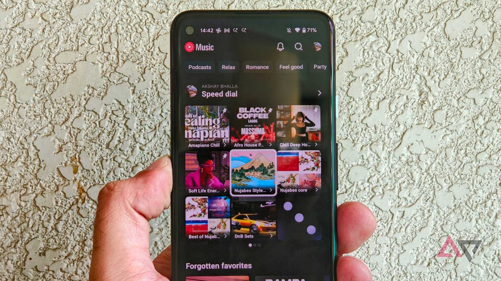 A Pixel 4a with YouTube music showing speed dial feature
