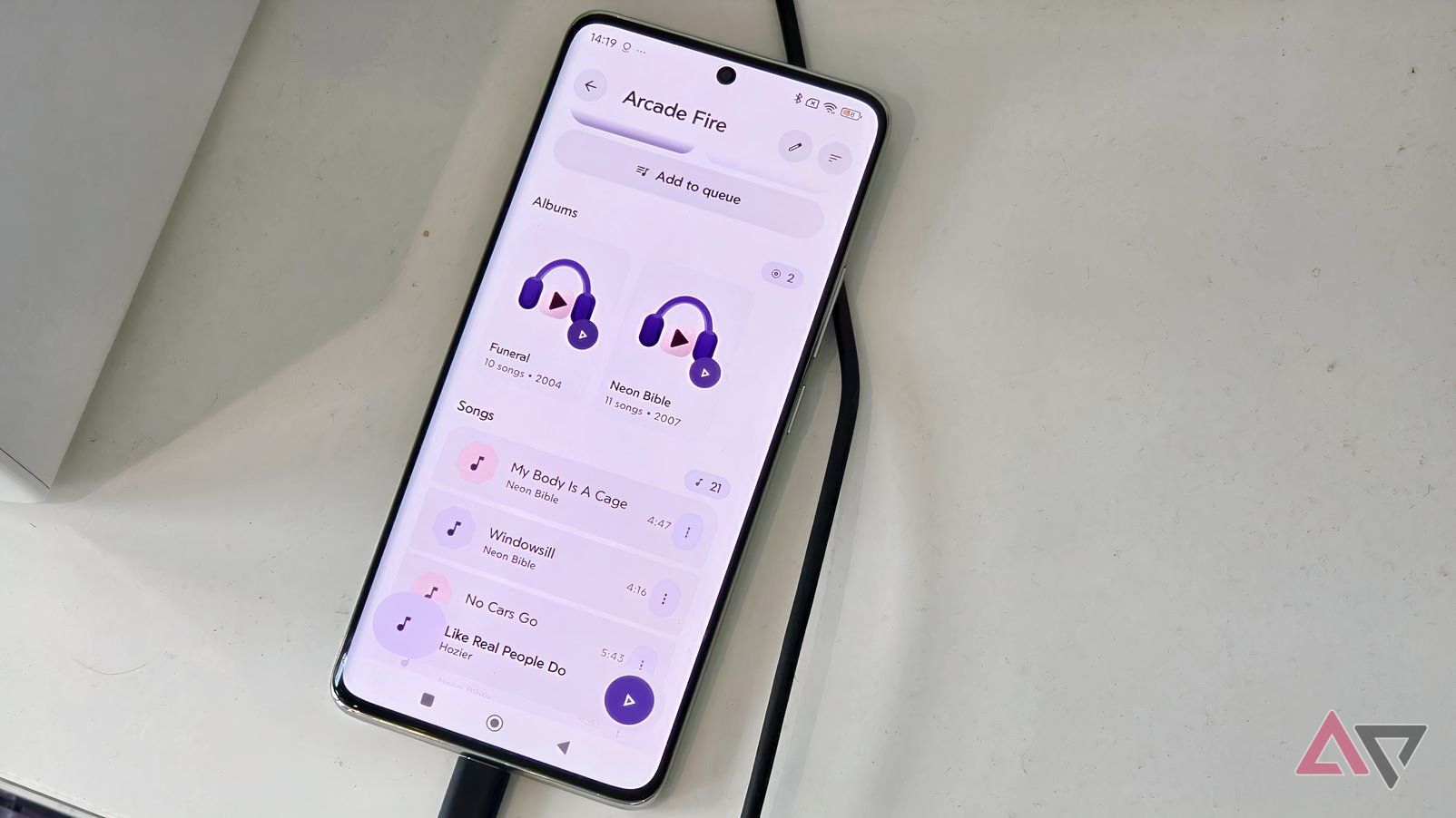 A Poco X7, showing the Rhythm app with Arcade Fire's profile.
