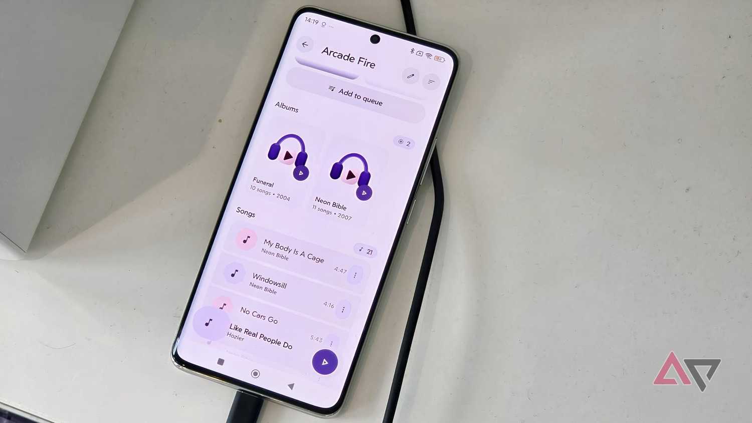 A Poco X7, showing the Rhythm app with Arcade Fire's profile.