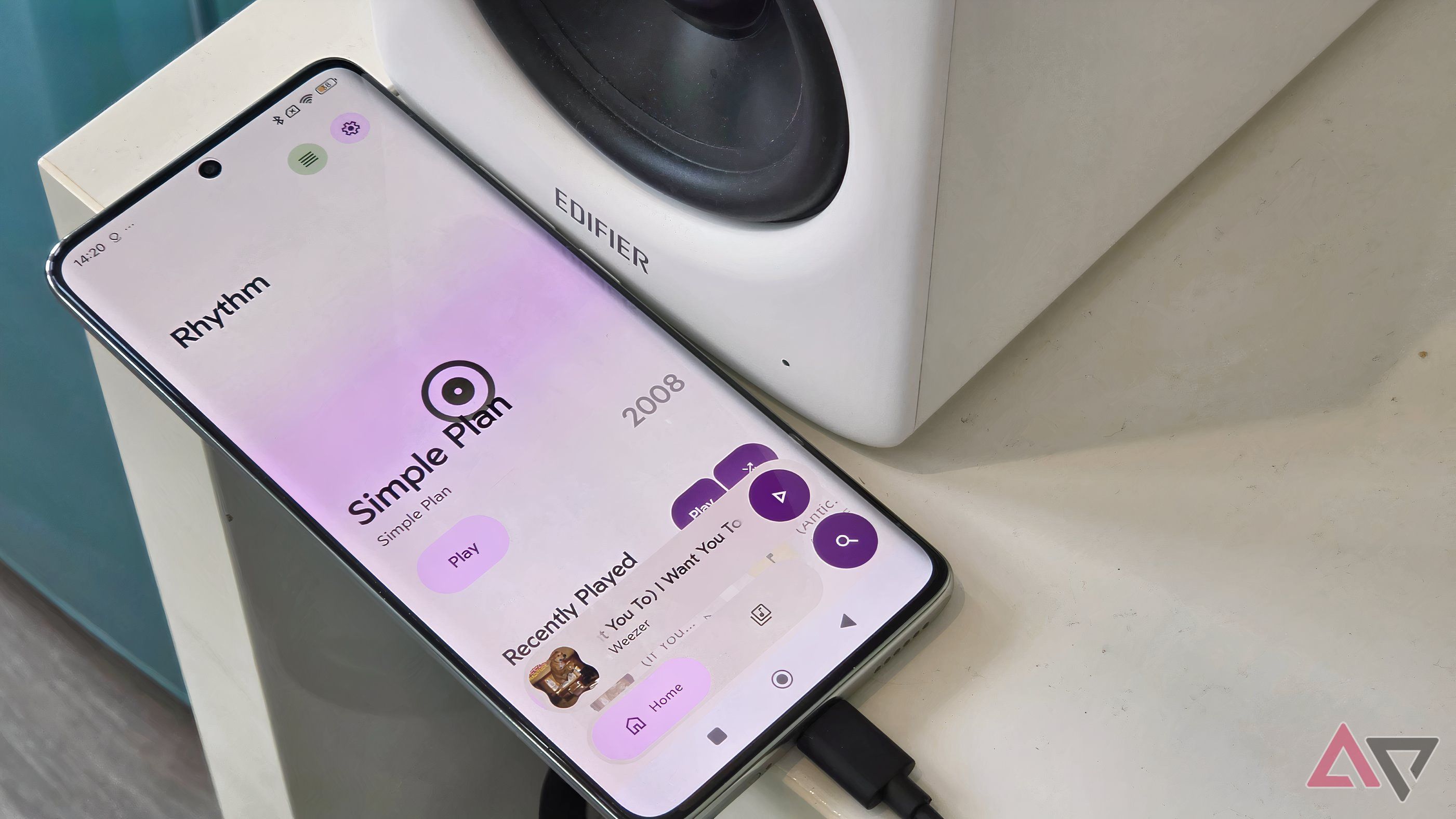 A Poco X7 plugged into an Edifier M90, showing the Rhythm app.
