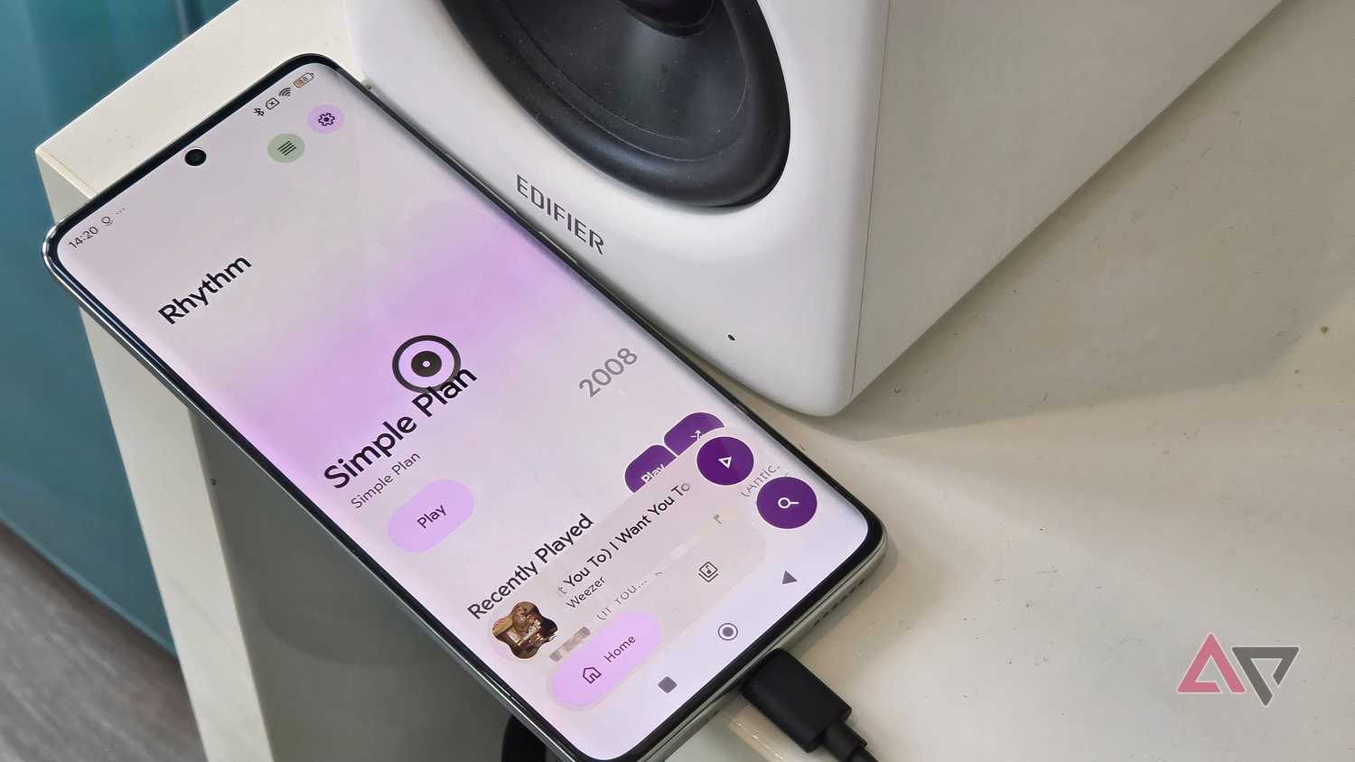 A Poco X7 plugged into an Edifier M90, showing the Rhythm app.