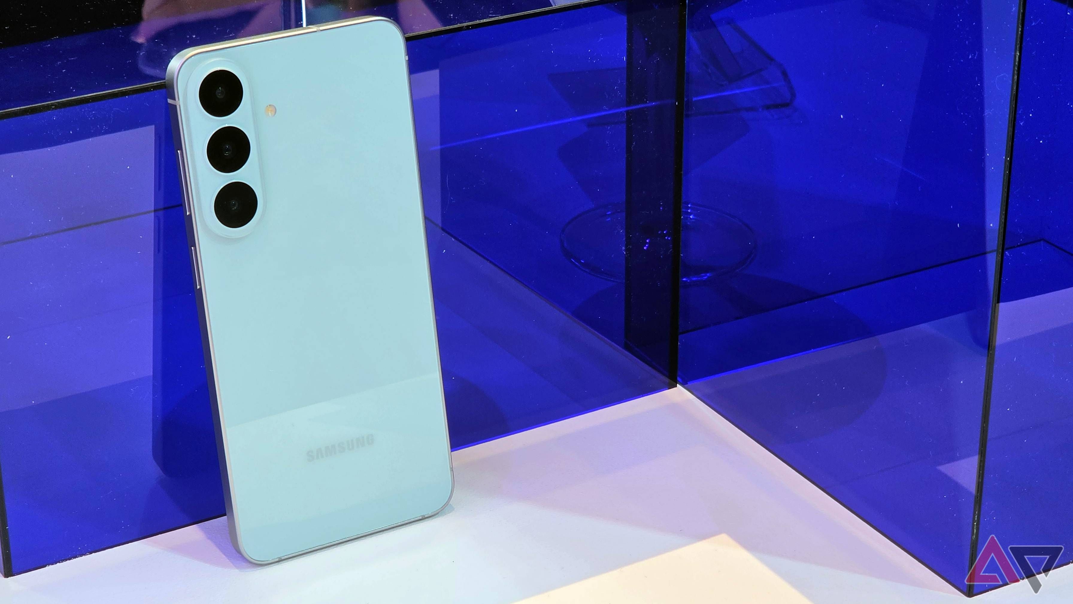The Samsung Galaxy S26 FE leaning on a blue box.