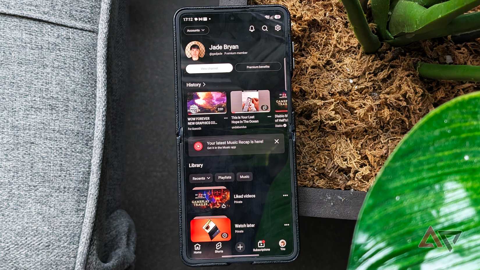 Samsung Galaxy Z Flip phone with YouTube Premium opened
