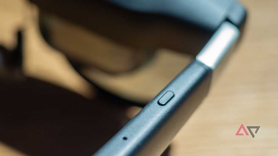 Xreal Aura glasses, focus on the primary button