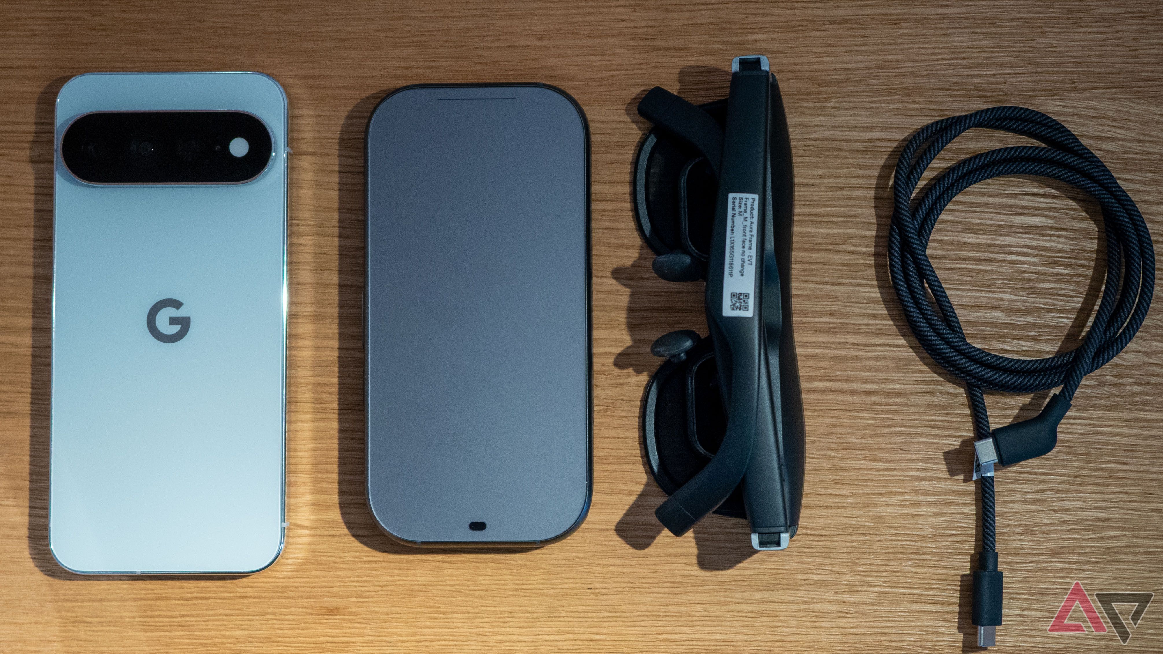 Xreal Aura glasses, cable, main unit, and Google Pixel 11 Pro XL