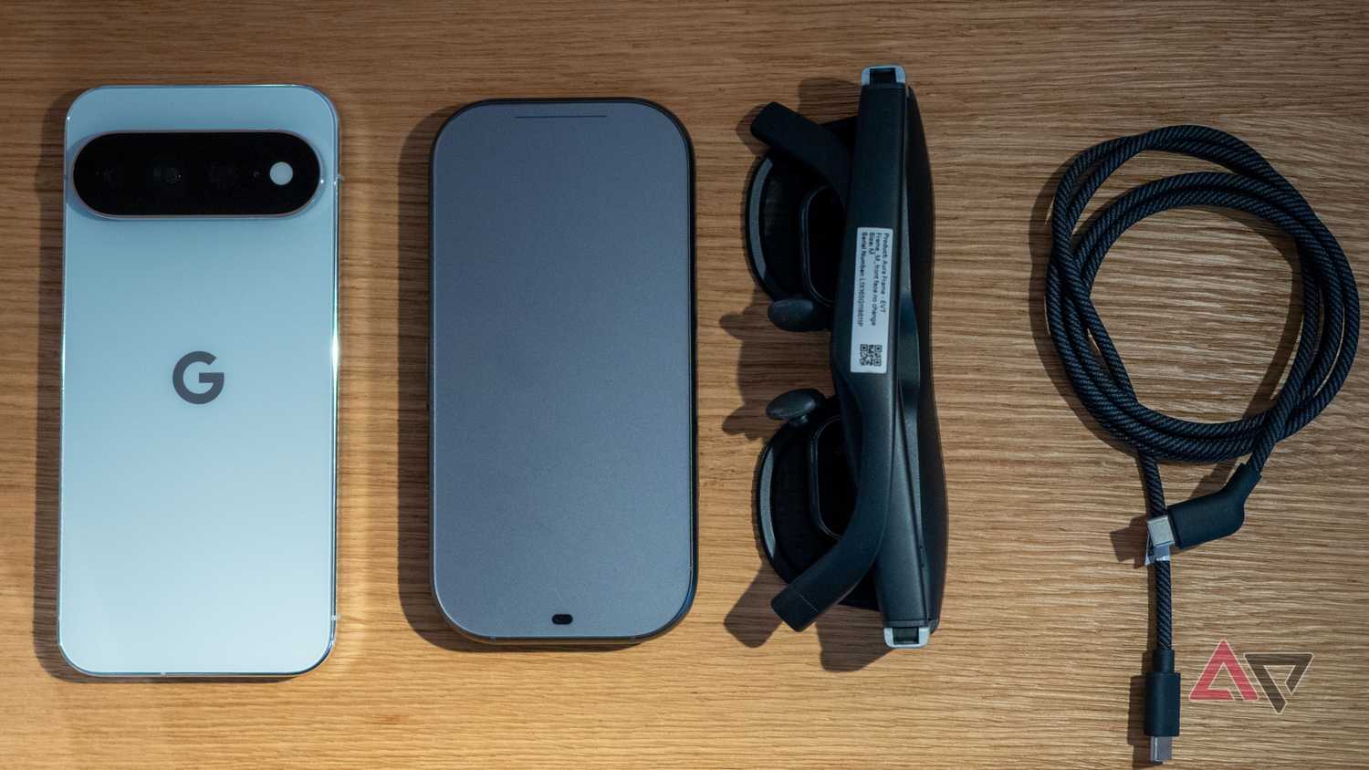 Xreal Aura glasses, cable, main unit, and Google Pixel 11 Pro XL